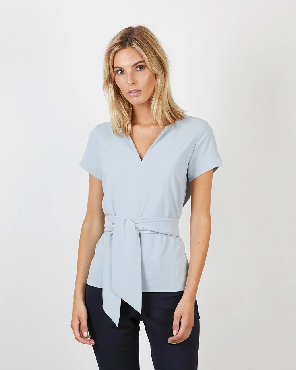 Olivia_top_lightblue_belt_1399sek_441d83a6-4da8-4ec1-b690-0b0cc58d63b5_1024x1024@2x.jpg