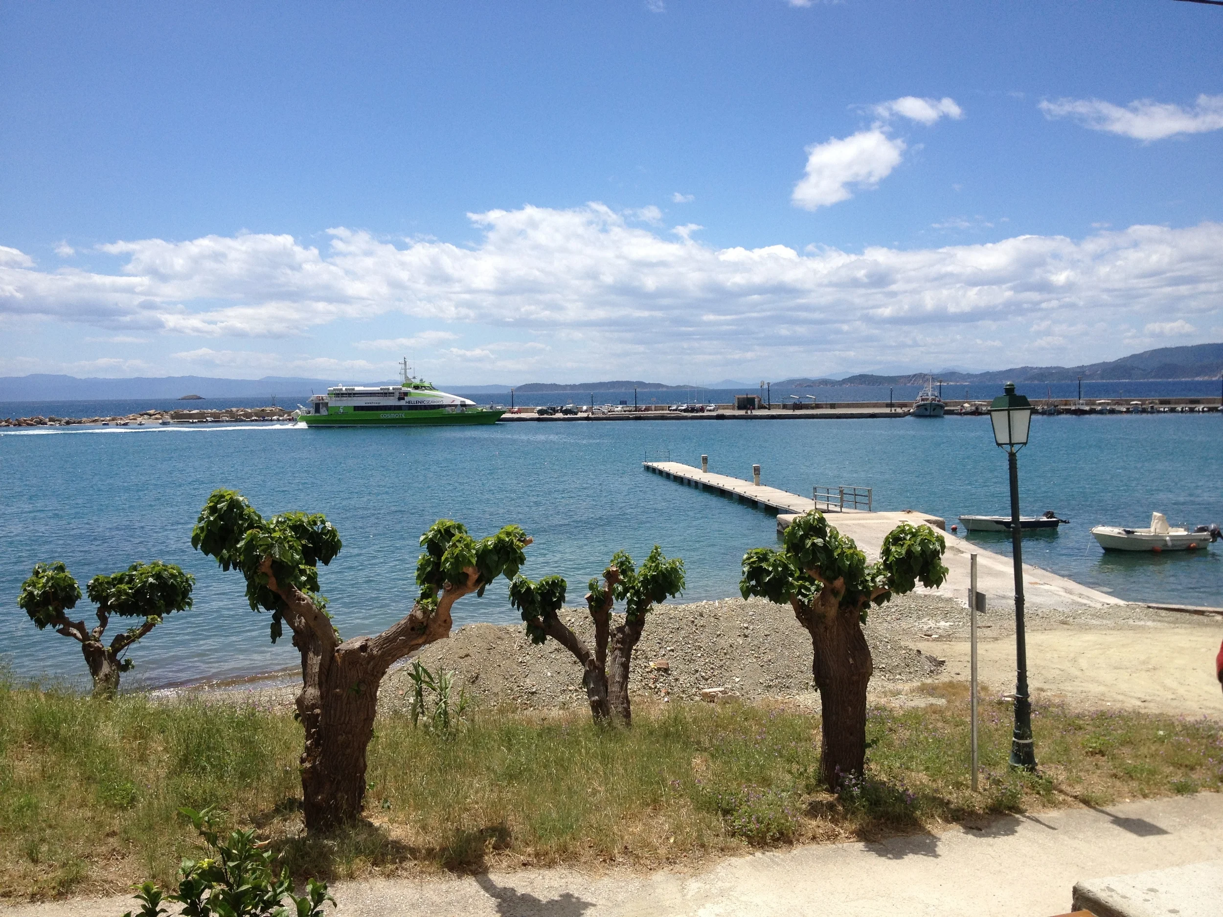 Catamaran Arrives - From Petrinos.JPG