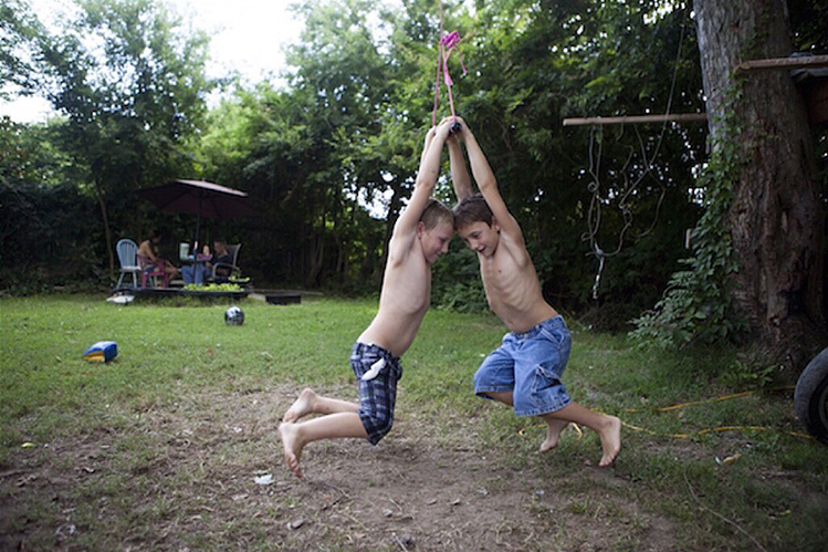 Jordyn & Boog swing around in the yard.