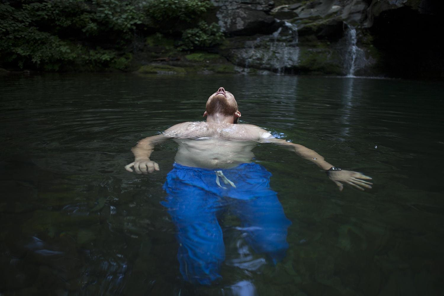 Rafal Rogoza enjoys a dip in a swimming hole at Plattekill Clove.
