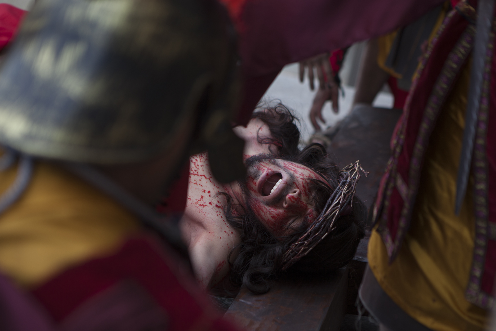 Elmer Ventura, as Jesus, is crucified.