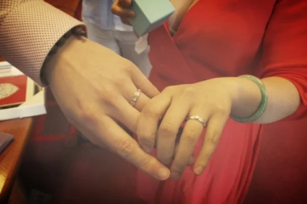 A very real and intimate photo of us right after we exchanged wedding rings at city hall. I was so happy at that moment.