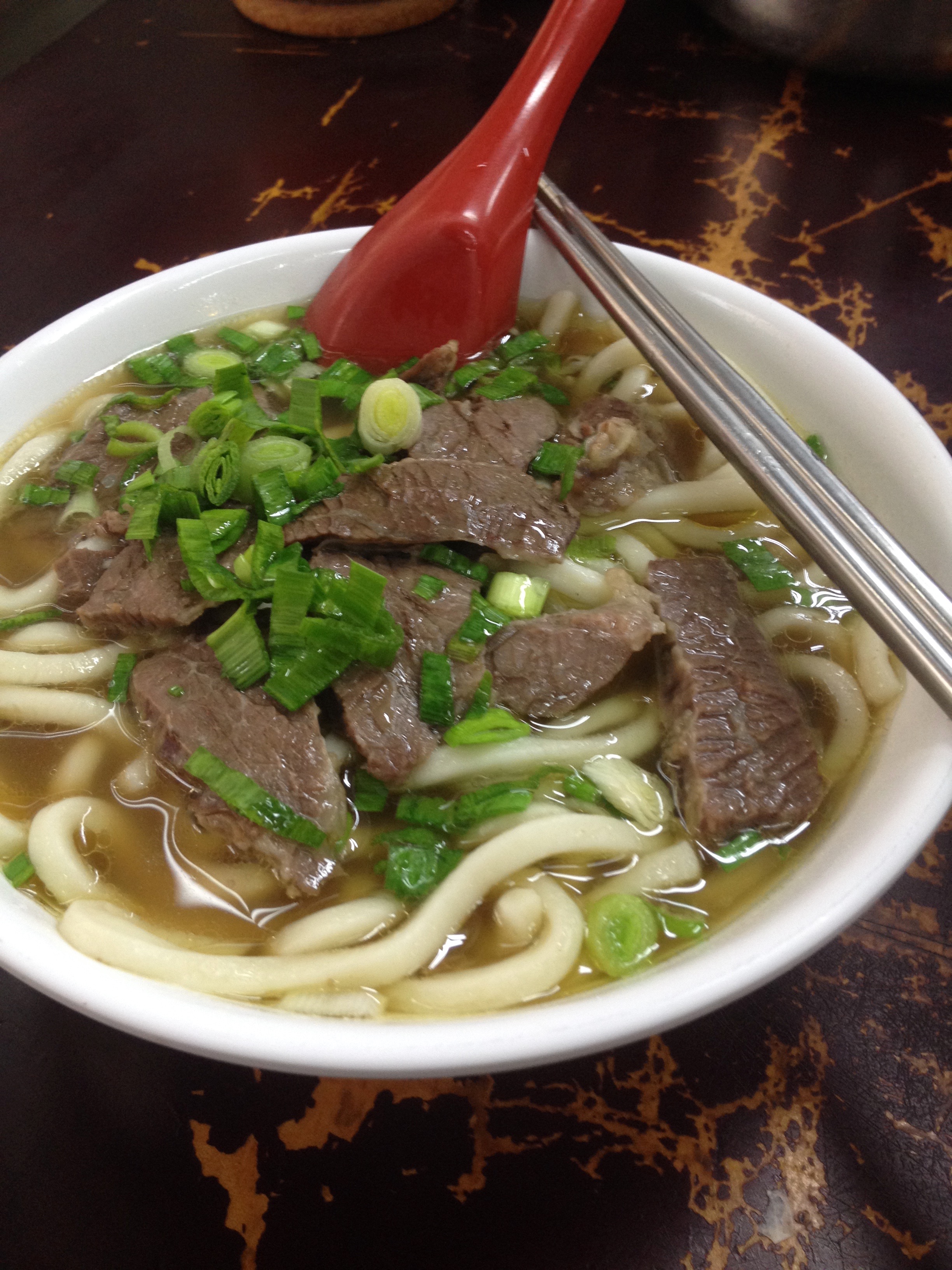 Beef noodle soup from a local shop near Taipei Main Station.