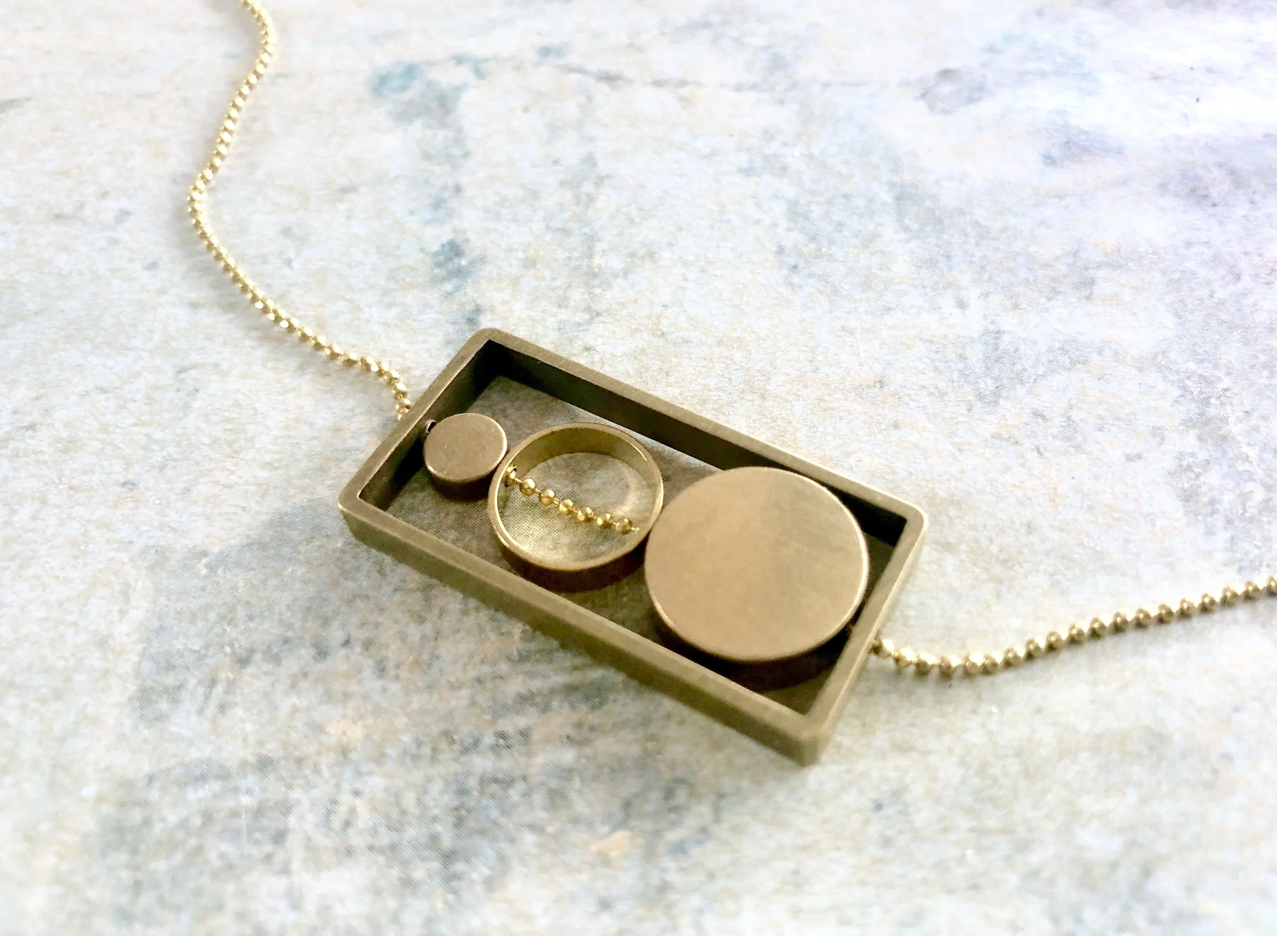 Modern three peas in a pod necklace, three circles in a rectangle necklace