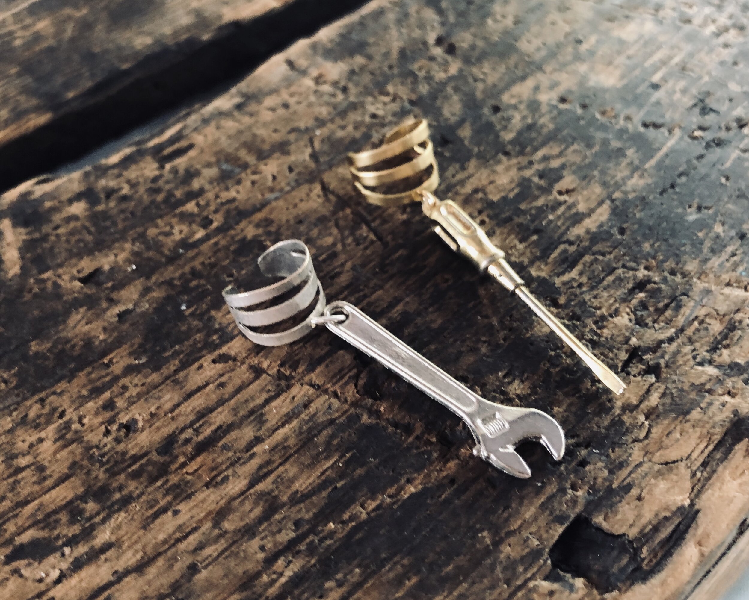 Miniature tool ear cuff