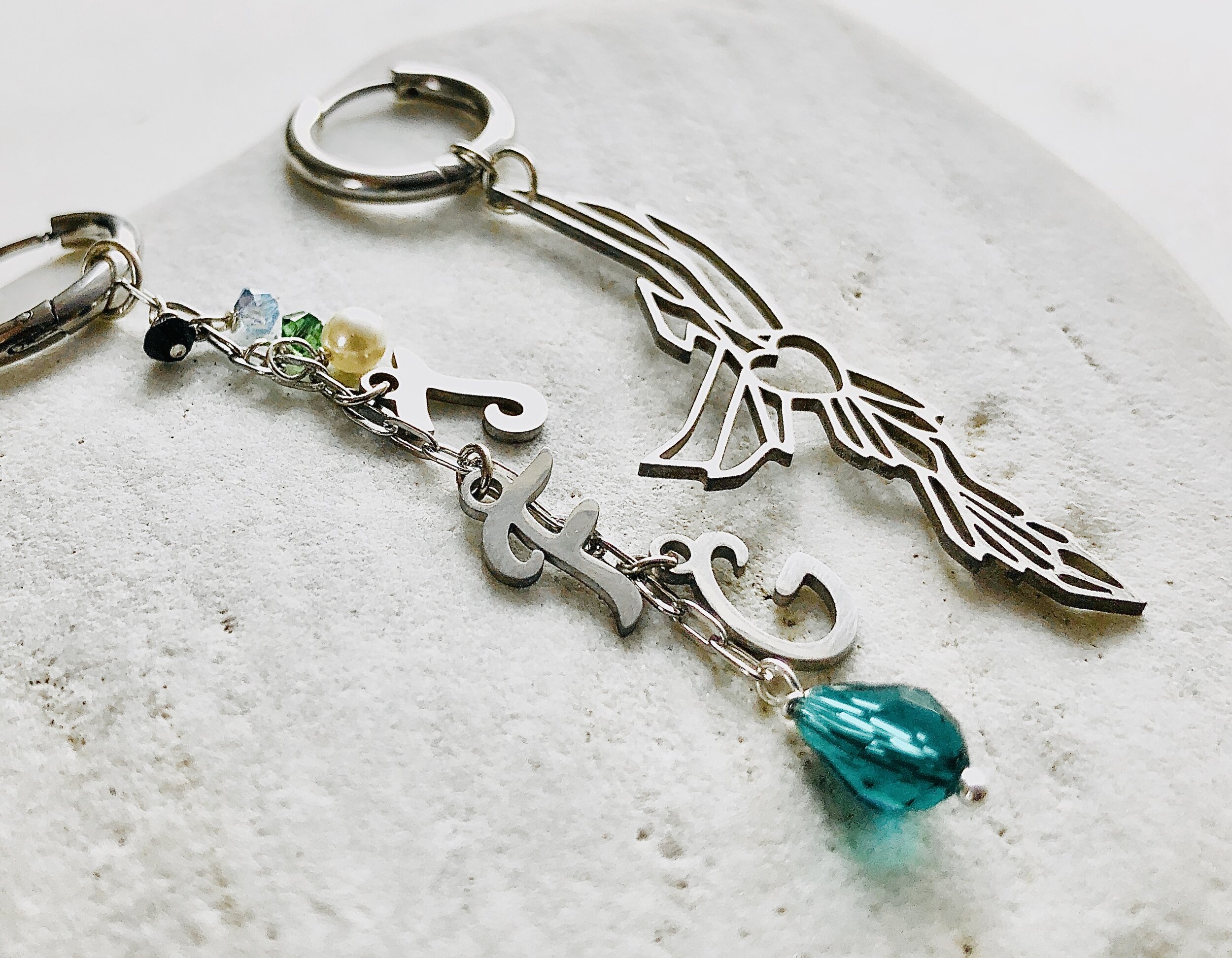 Phoenix and crystal TFG charm dangle earrings - mismatched pair