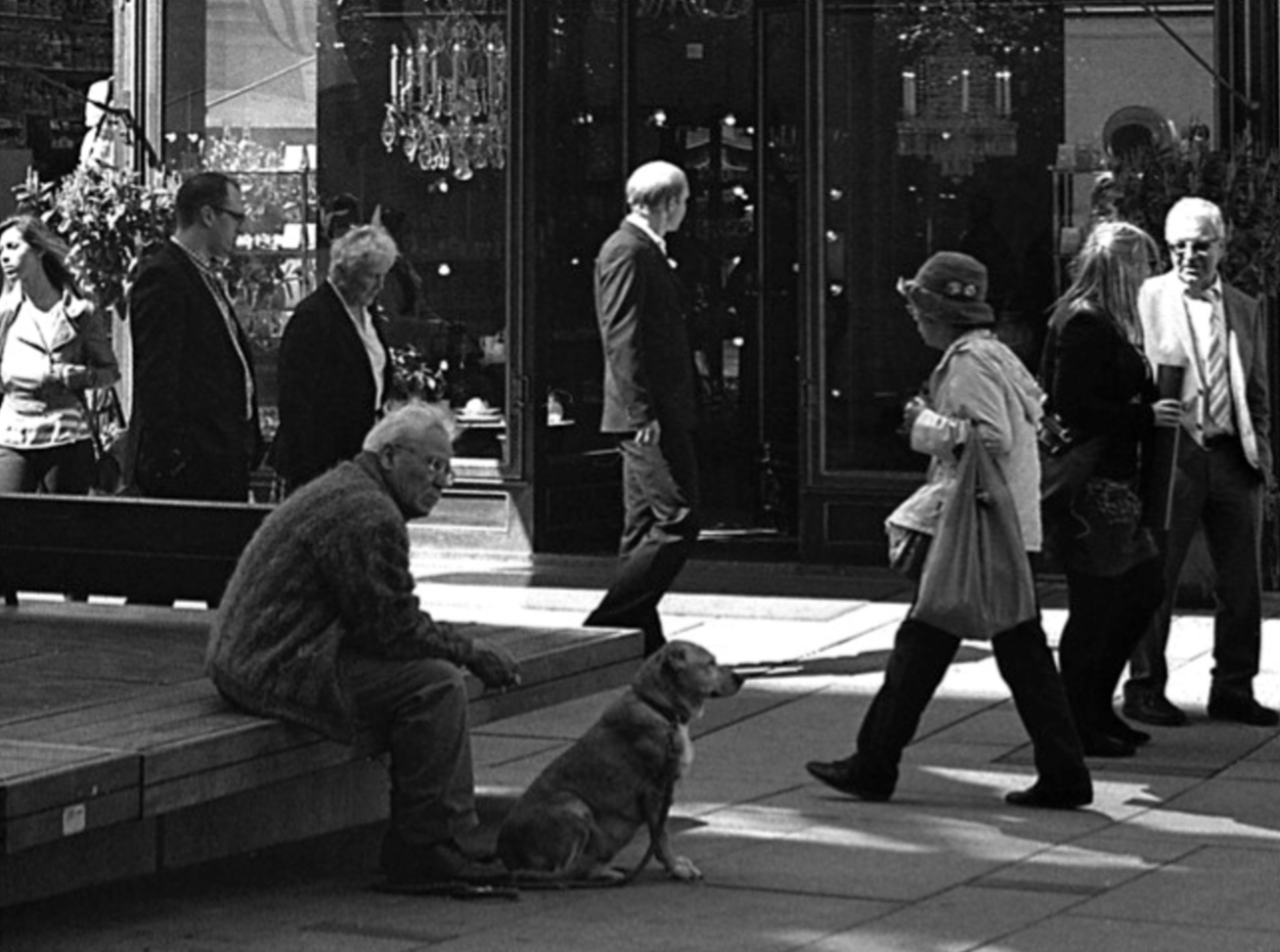 The simple art of sitting with your best friend, Vienna, Austria. // Mamiya ZE-2, Kodak T-Max 400, Epson V330// Just like 'Just Waiting' this man is also seemingly waiting, dog by his side. I think he is waiting beautifully.