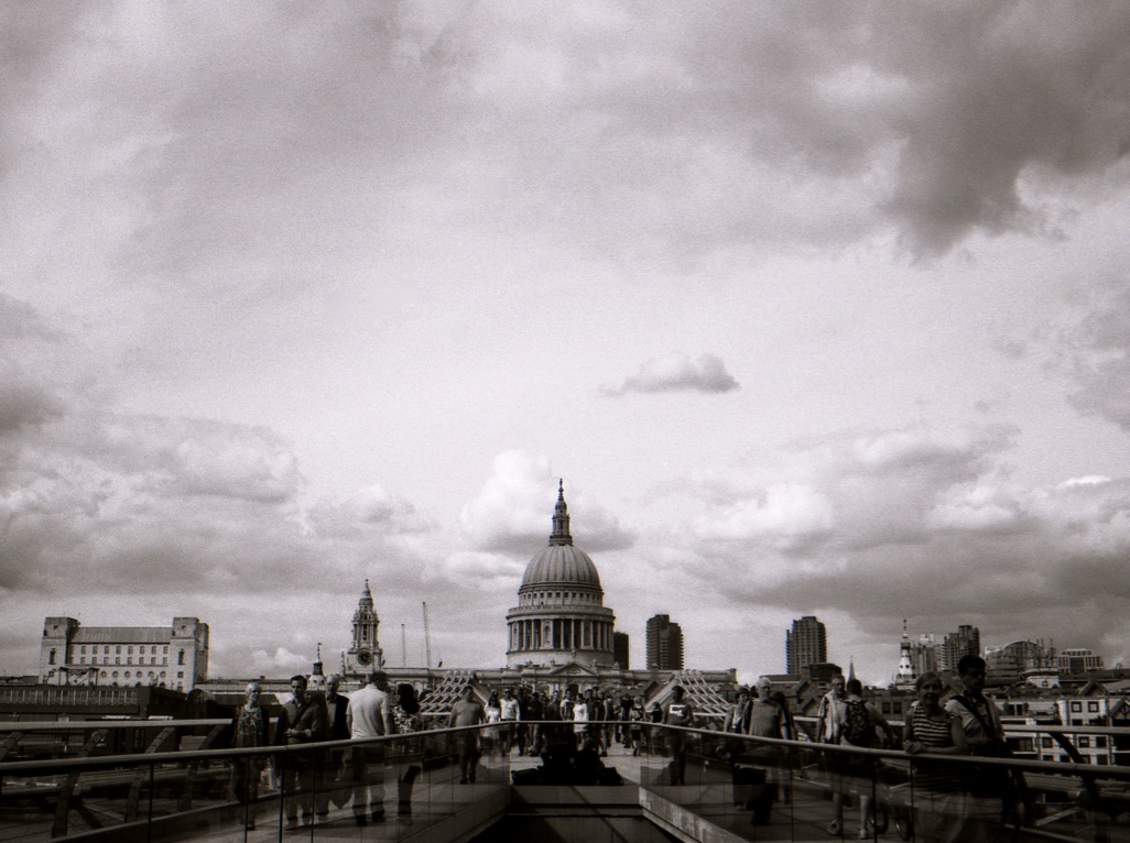 View of St Paul's Cathedral from the Millennium Bridge, London, England (Summer 2013) // Fuji Neopan Acros 100, Olympus OM-2n, Epsom V330 // I can't help but be moved by the view of St Paul's Cathedral constructed in 1675 whilst stood on 'Millennium Bridge', a 'swinging bridge' that opened in 2000. It is amazing how the British landscape has evolved over the past 500 years. How do we preserve awe inspiring heritage whilst creating awe inspiring, socially relevant innovation? There is beauty both in the past and in the future. 
