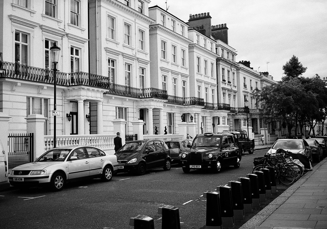 Classic Black Taxi, Notting Hill, London, England (Summer 2012) // Kodak T- Max 100, Zorki - 4, Epsom V330 // The black cab is to London like the LV logo is to Louis Vuitton.