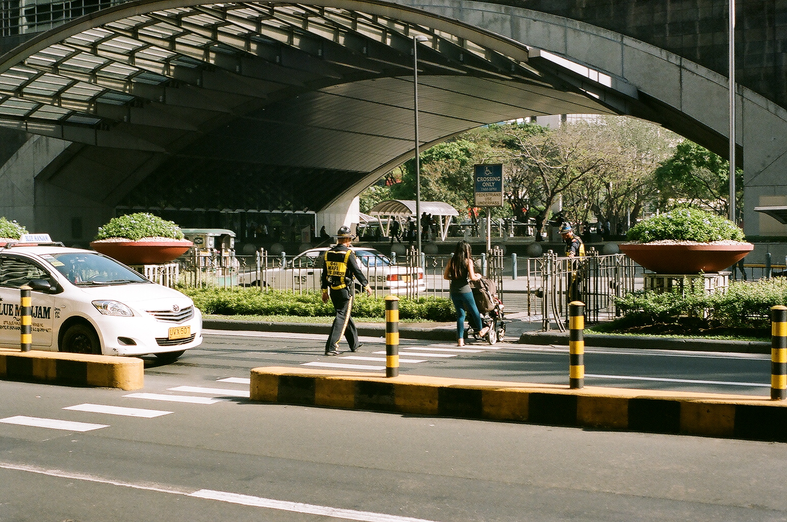 I will take care of you, Makati, Manila, Philippines (Summer 2016) // Kodak Portra 160, Mamiya ZE-2, Epsom V330 // How can we build communities of kindness? It's quite peculiar because the fact that traffic only stops at a red light if no one is crossing (kind of dangerous) is one of the reason that we have the traffic marshals in the Philippines. Having said that, the fact that the Philippines has less rules also allows drivers to me more hospitable, squeezing on that extra passenger, taking on a chicken, driving a bit above limit, stopping because someone needs to use the bathroom. To what extent do 'too many rules' mean that we don't give as much as we can (obviously without anyone getting hurt.)