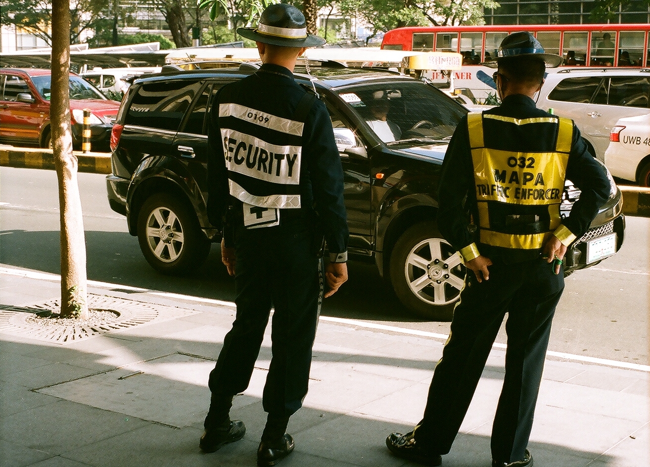 Structure and safety, Makati, Manila, Philippines (Summer 2013) // Kodak Portra 160, Olympus Om-2n, Epson V330 // What role do humans have in the experience of safety? If we replace a human with a computer, do we feel as safe or as cared for? A March 2017 article in WIRED , Silicon Valley Would Rather Cure Death than Make Life Worth Living , explores the downside of our addiction to creating with technology. Perhaps then, our then we can shift our creative efforts into making with humans in mind, not for efficiency, but for cultivating and enriching life experience. 