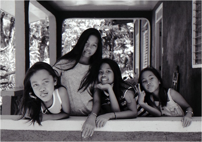 Young, Ragay, Camarines Sur, Philippines (Summer 2013) // Ilford HP5, Mamiya ZE-2, Epson V330 // When we create, me must preserve what is most precious about the human experience, the essence of the childhood spirit — connection, fun and joy. If we do not create for this purpose, why are we creating at all? 