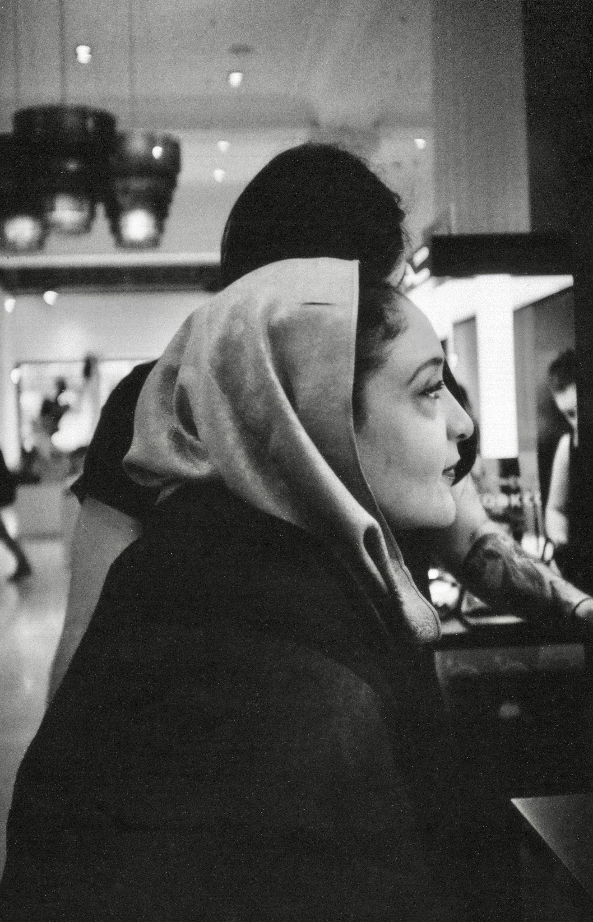 Satisfaction, MAC Cosmetics, Selfridges, London, England (Summer 2012) // Ilford XP2 400, Minolta Hi-Matic, Epson V330// Seeing a piece of work, whether it is a house or a new look, come together integrates several emotions. If it is pleasing to you, we see joy, anticipation, peace. If it is displeasing we witness disappointment, fear and anxiety. In this image Agila was peacefully pleased at how well her new look was taking shape. What was interesting to see was that in order to create positive emotions whilst crafting her look, a constant dialogue took place between her and the make- up artist. Their work was not the work of one man but a conversation between two visionaries with Agila steering the direction of his expertise. To create a pleasant customer journey, not only do we require deep knowledge of what creates pleasure, but also deep knowledge of how to listen, even if the person is not speaking. 