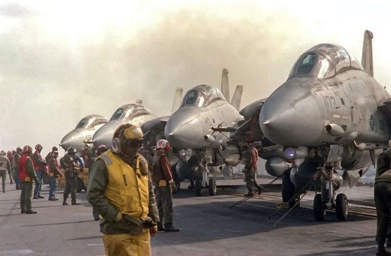 Tomcats on flight deck - warming.JPG