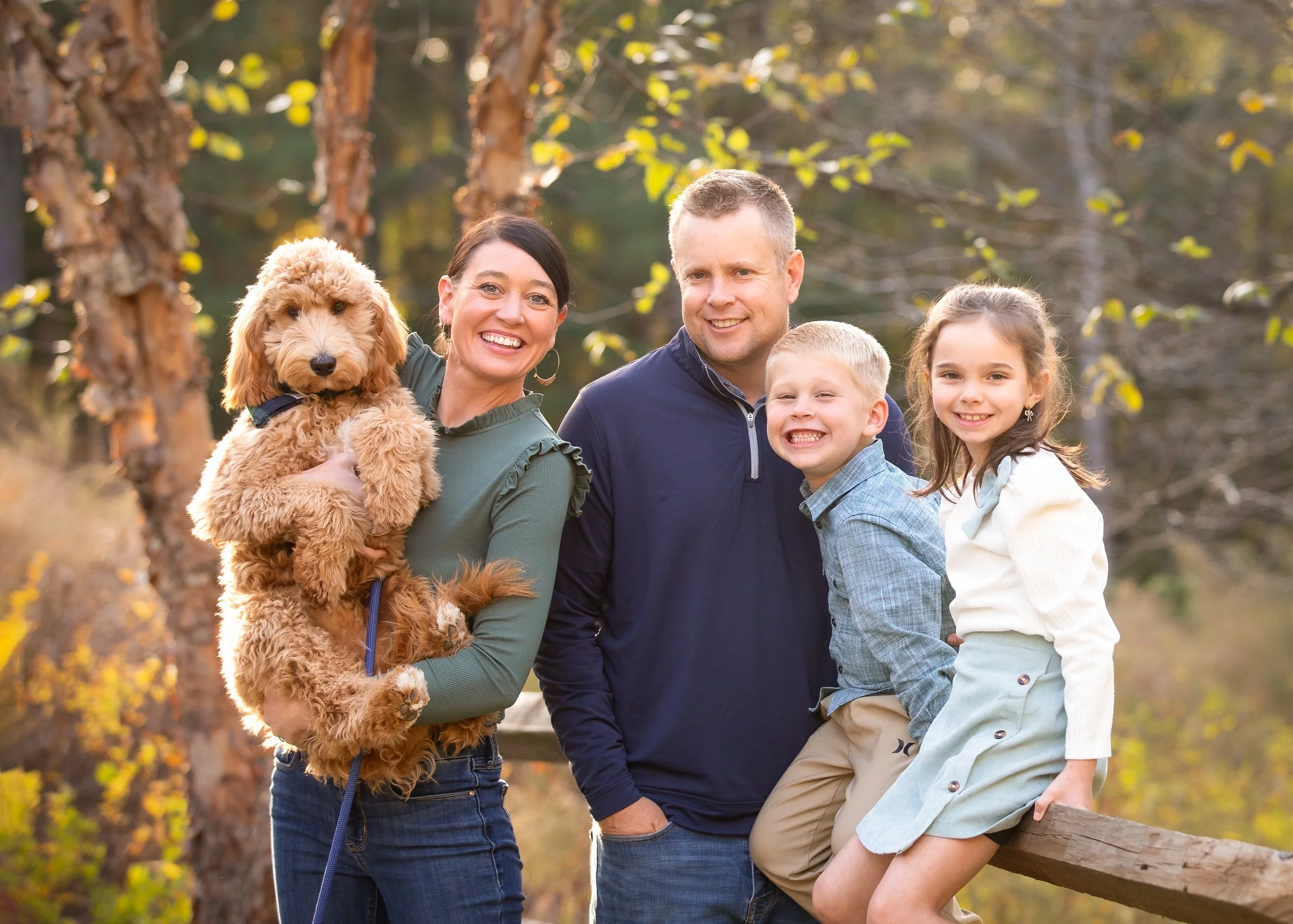 family with dog at park raleigh photographer.jpg