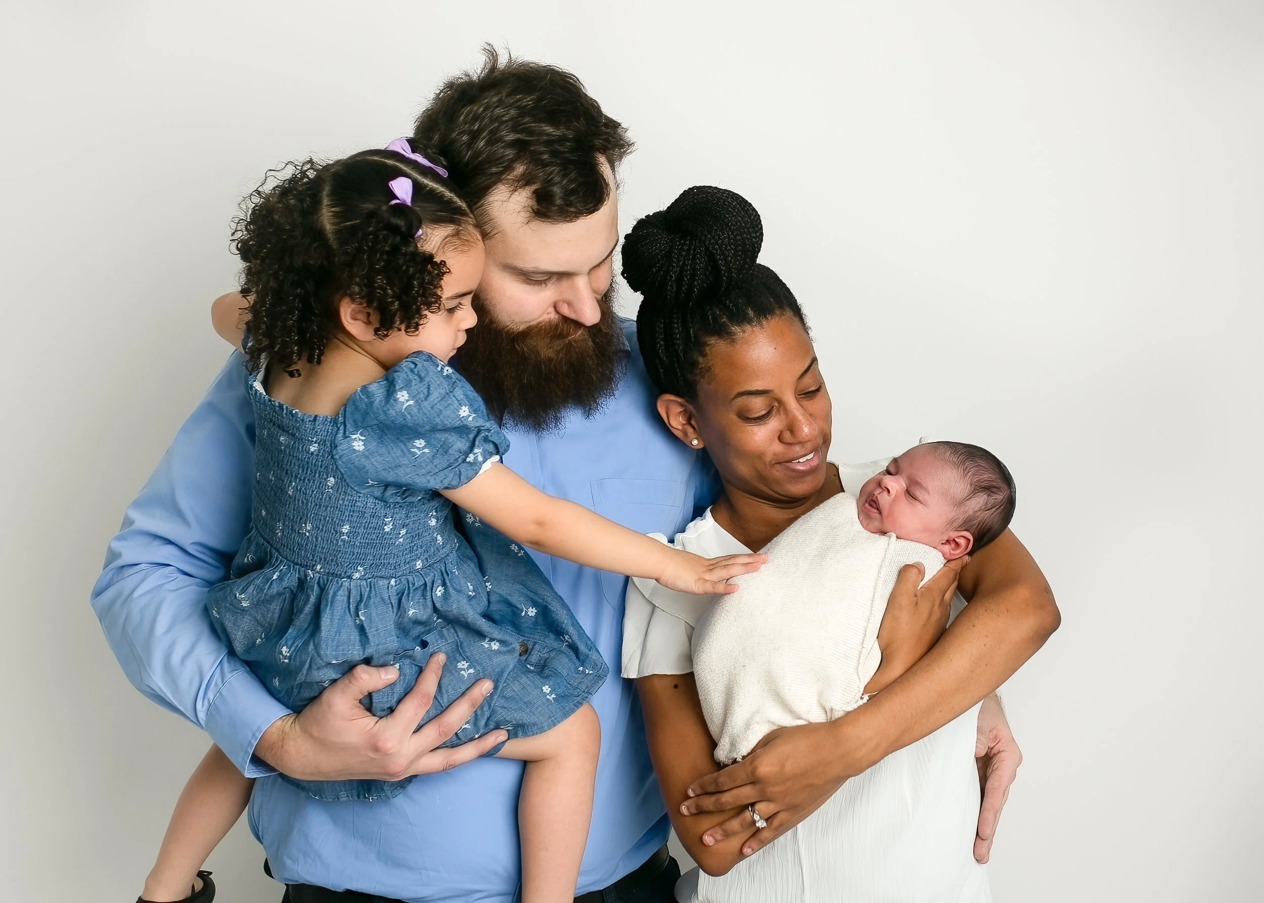 family with newborn wake forest studio.jpg