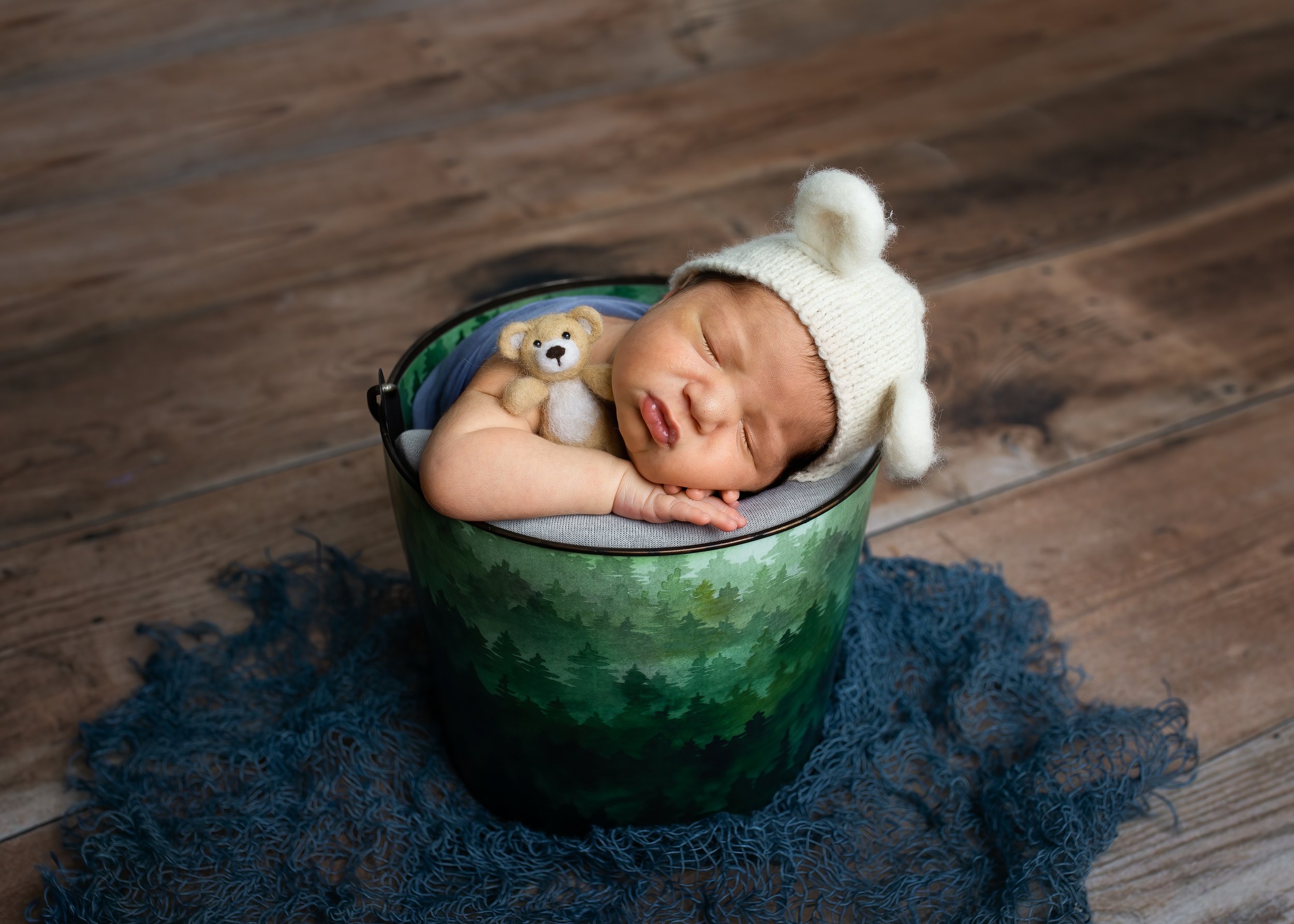 newborn sleepinh in bucket wake forest session.jpg