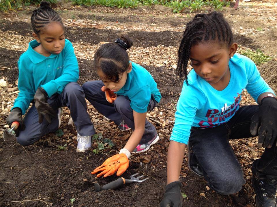 Swag Project- girls planting.jpg