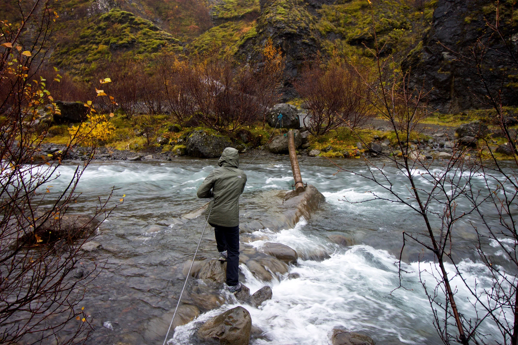 Crossing the river to reach Glymur.