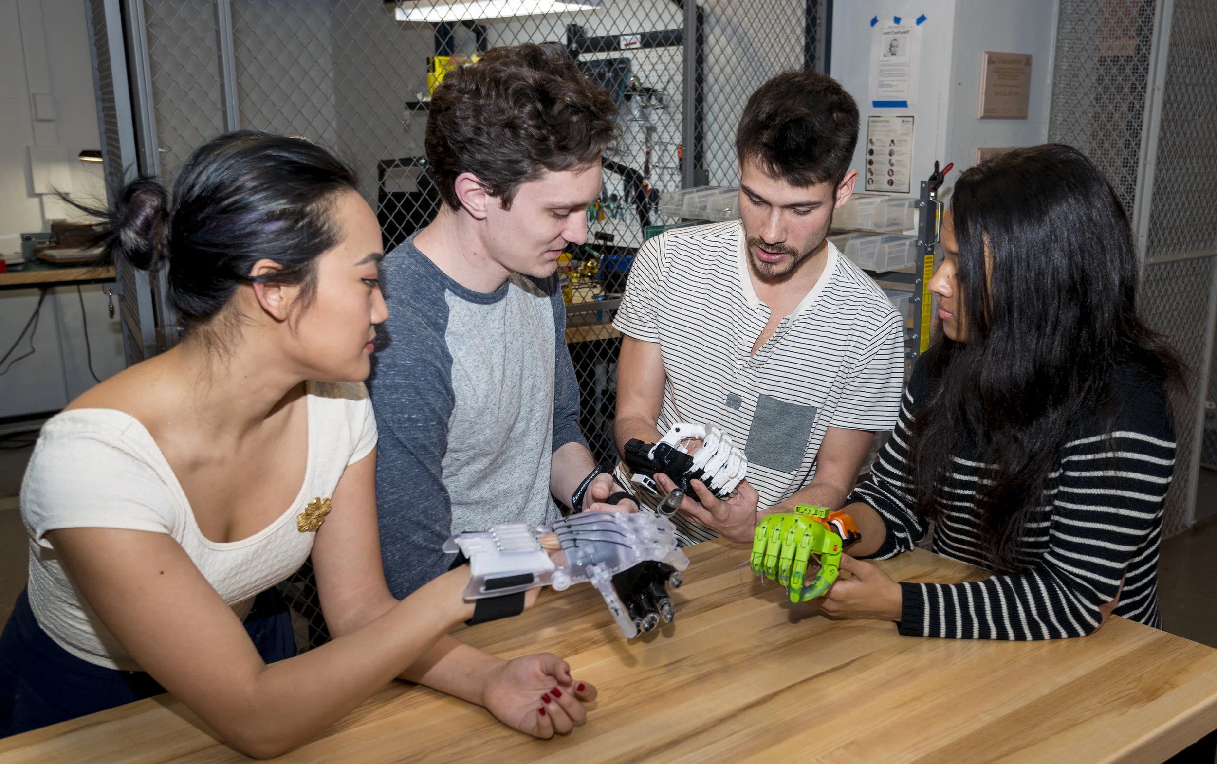 JeffDESIGN Medical Students, testing out a few different versions of 3D printed prosthetic hands, including a robotic hand that can be produced at a fraction of the cost of commercial robotic prosthetics. 