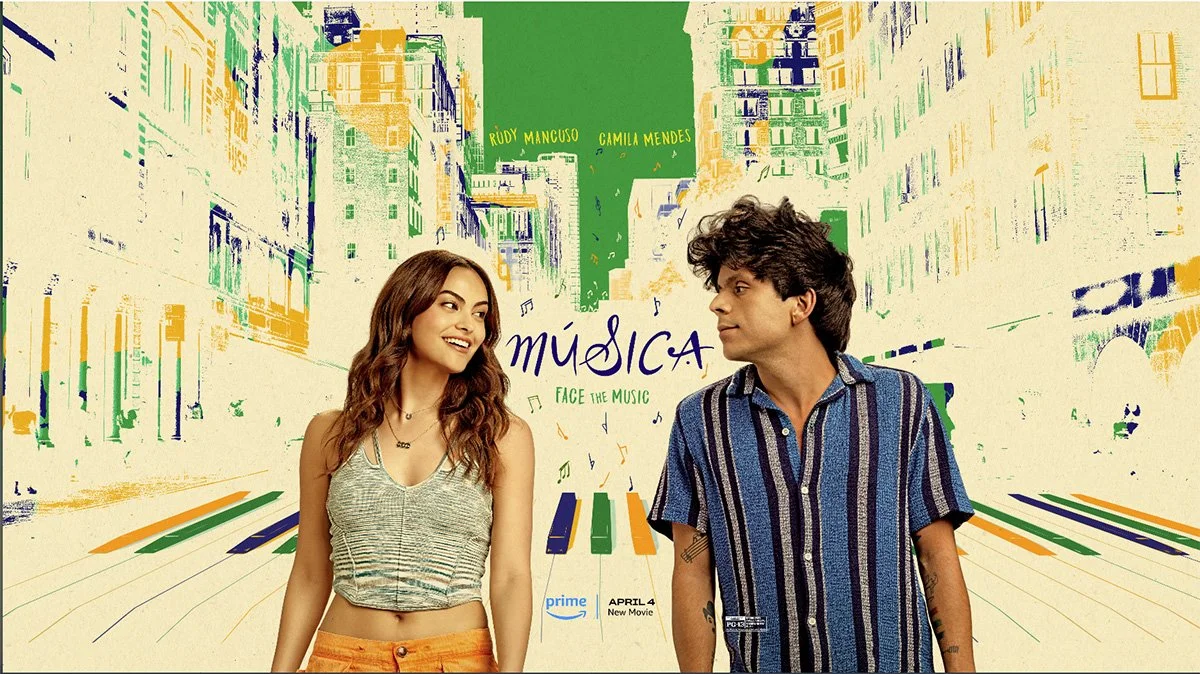 A promotional poster for the movie 'Música: Face the Music' showing a girl and a boy walking towards each other in a colorful, stylized cityscape background. The girl has long brown hair, is wearing a striped gray crop top and orange pants, and is smiling at the boy. The boy has dark, curly hair, is wearing a striped blue and black button-up shirt, and is looking at the girl. The background features animated city buildings, a green sky, musical notes, and the movie's title and release date.