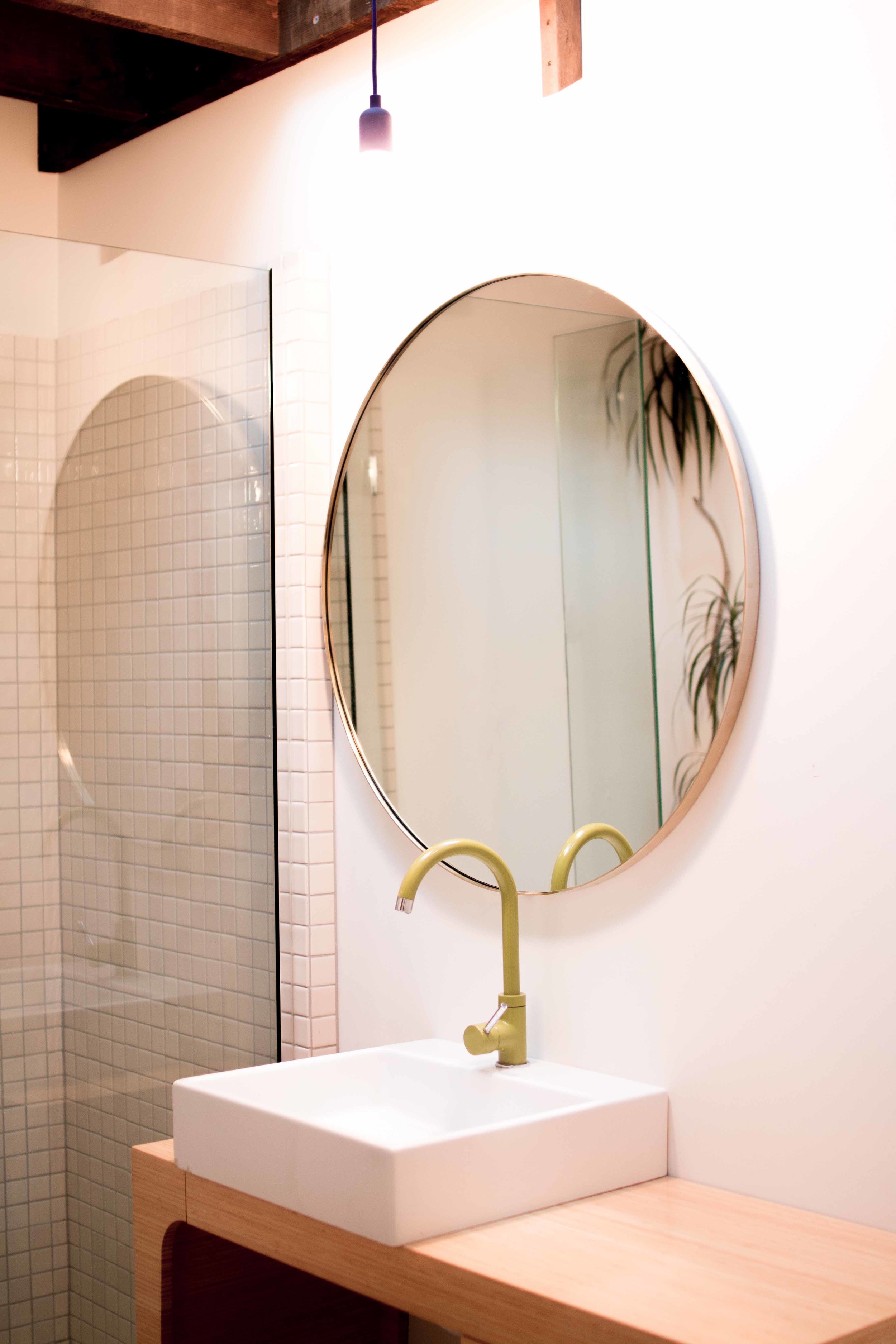 brass mirror bathroom.jpg