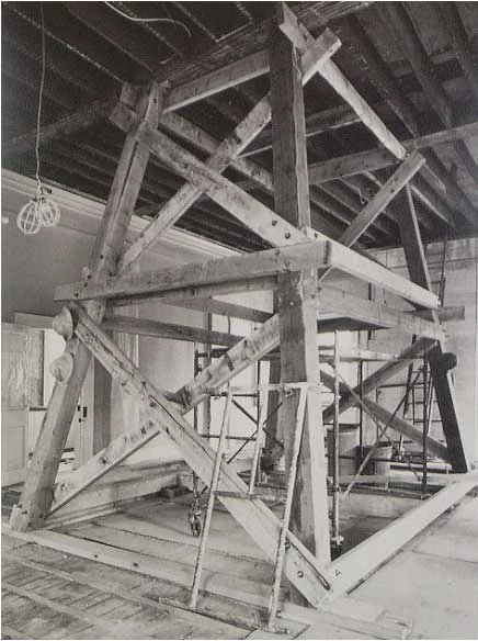 Shoring tower supported second floor trusses while holes were drilled for hanger rods suspended from steel beams in the attic. System was designed by Nicholas L. Gianopulos, drawing on work he did earlier in Park buildings.