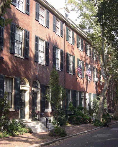 Stately homes lining Clinton St. no doubt contain lumber from the Linnards' yard, less than a block away.