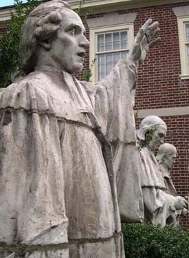 Presbyterian pioneers sculpted by Alexander Milne Calder preside over the garden of the Presbyterian Historical Society, at 5th & Lombard Sts. For 75 years they highlighted the Witherspoon Building's façade.