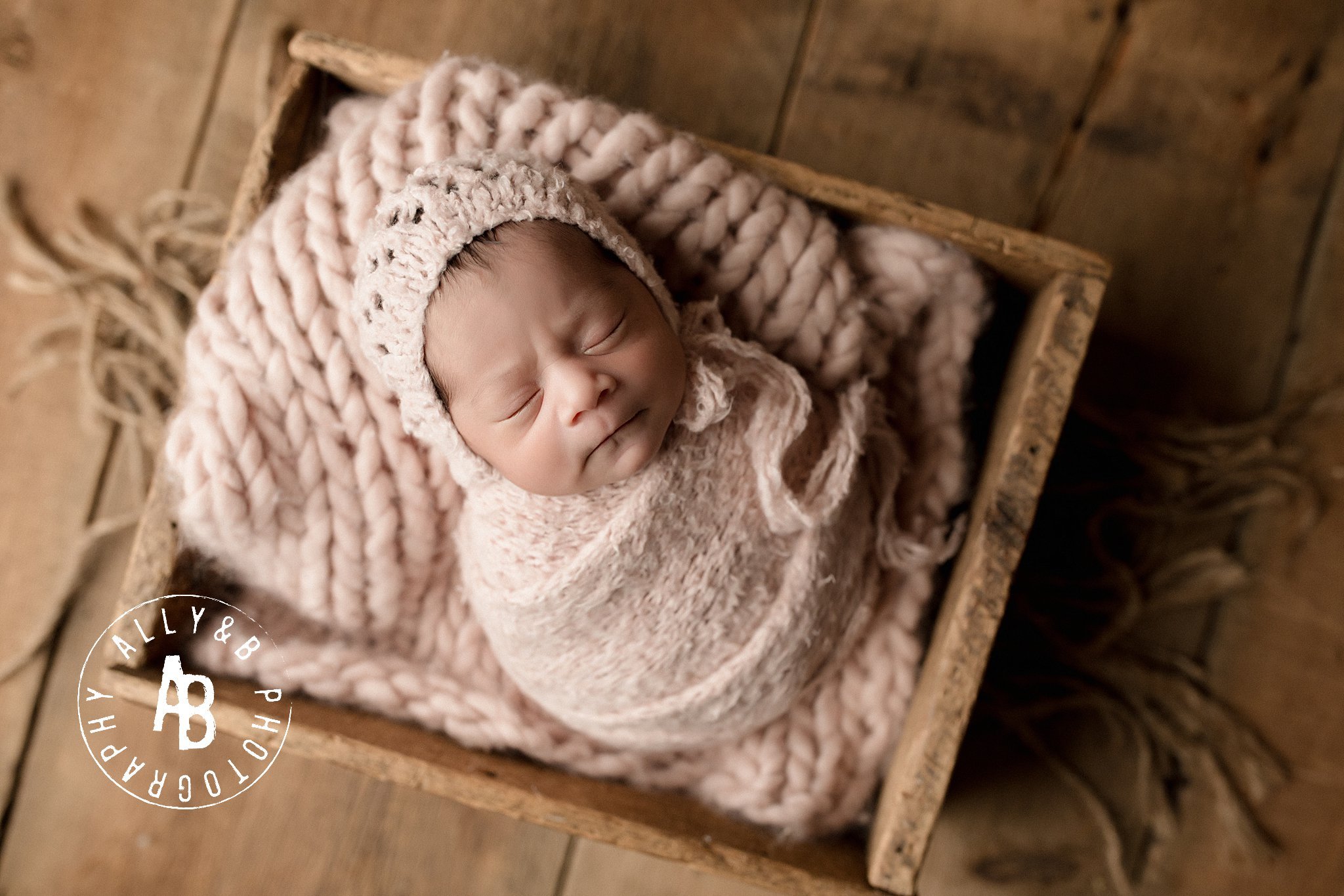 posed newborn photographer near me.jpg