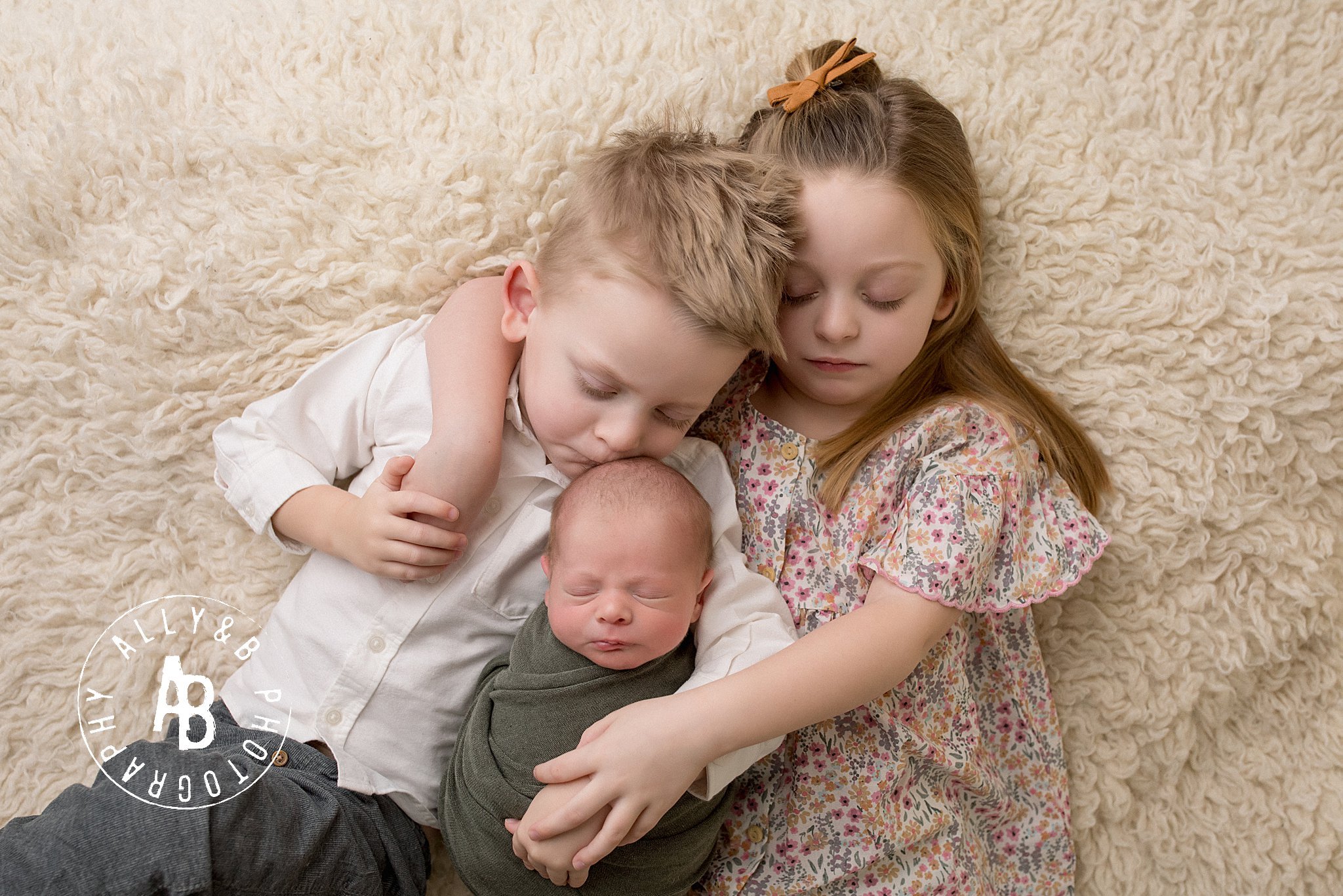 siblings and newborn.jpg