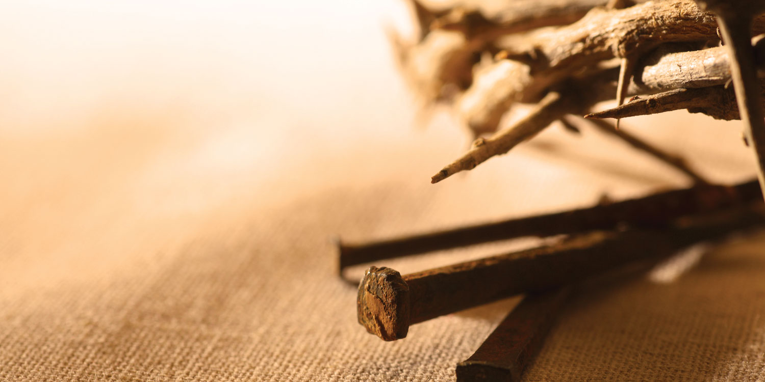 Cross Crown Of Thorns And Nails Symbolizing The Sacrifice And Suffering Of  Jesus Christ On A Bright Background Stock Photo - Download Image Now -  iStock