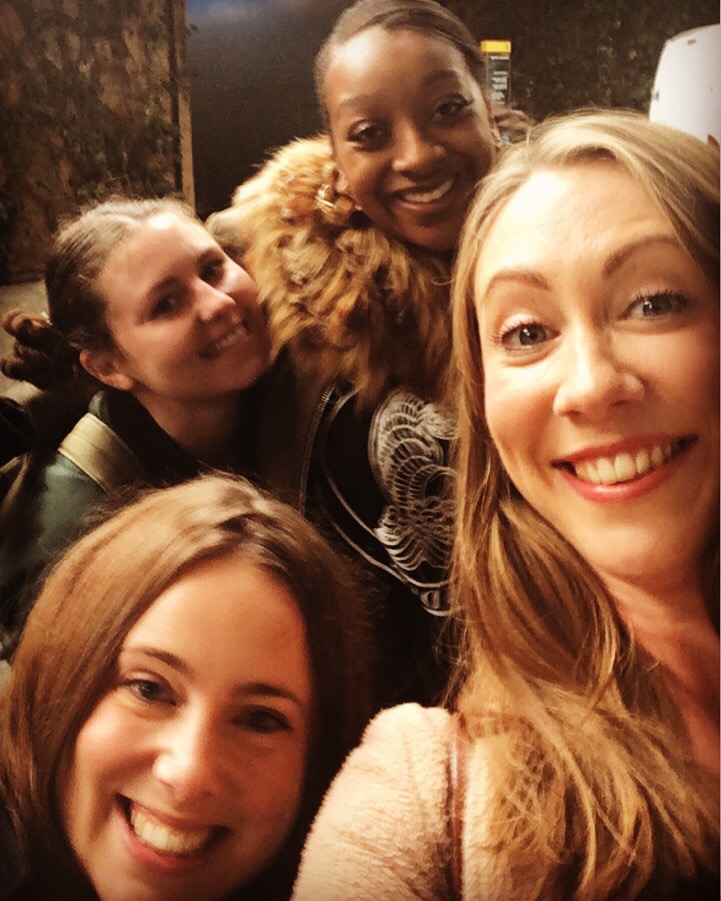 Four ridiculously happy faces playing it cool outside the IMAX