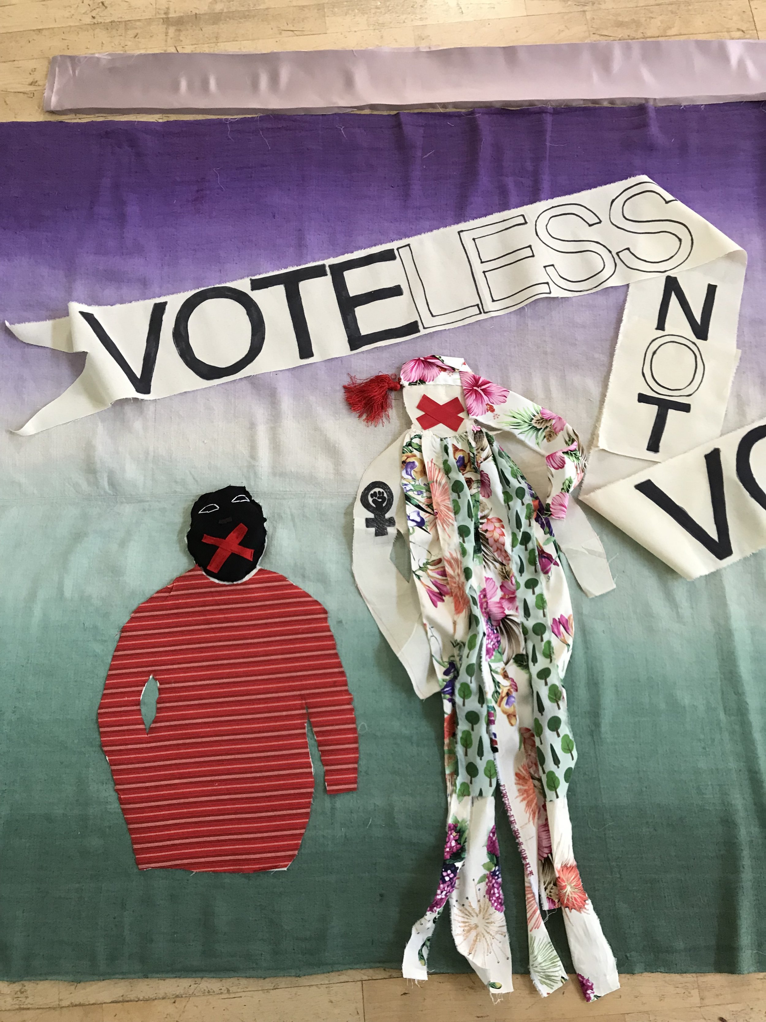  After several discussion, forum theatre and design sessions, we spent 3 days making: appliqueing and emboridering on a piece of 100 year old vintage linen that was dyed in the colours of the suffragettes: Green, White Violet: Give Women the Vote!  P