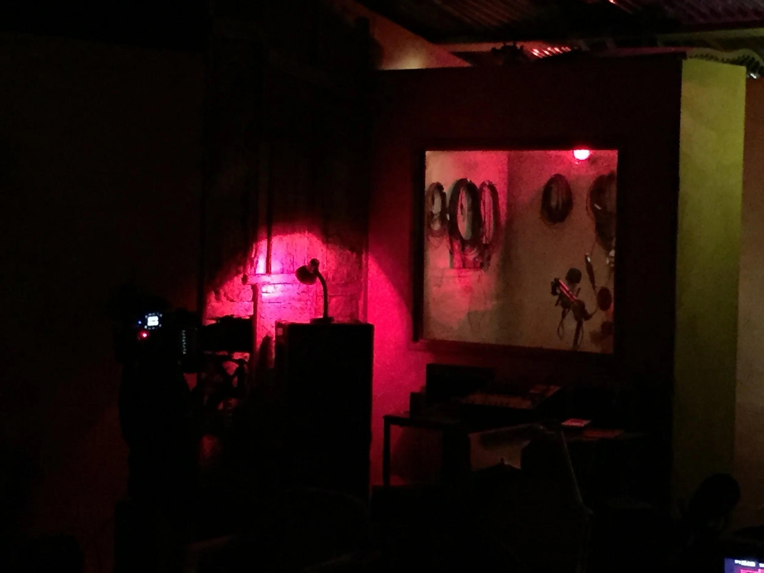  For the final tableau, the story of ‘ Cousin’, a young Zimbabwean girl who died from complications relating to an illegal abortion, is told through song in a set that is both recording booth and clinic, allowing different focus points for camera. 