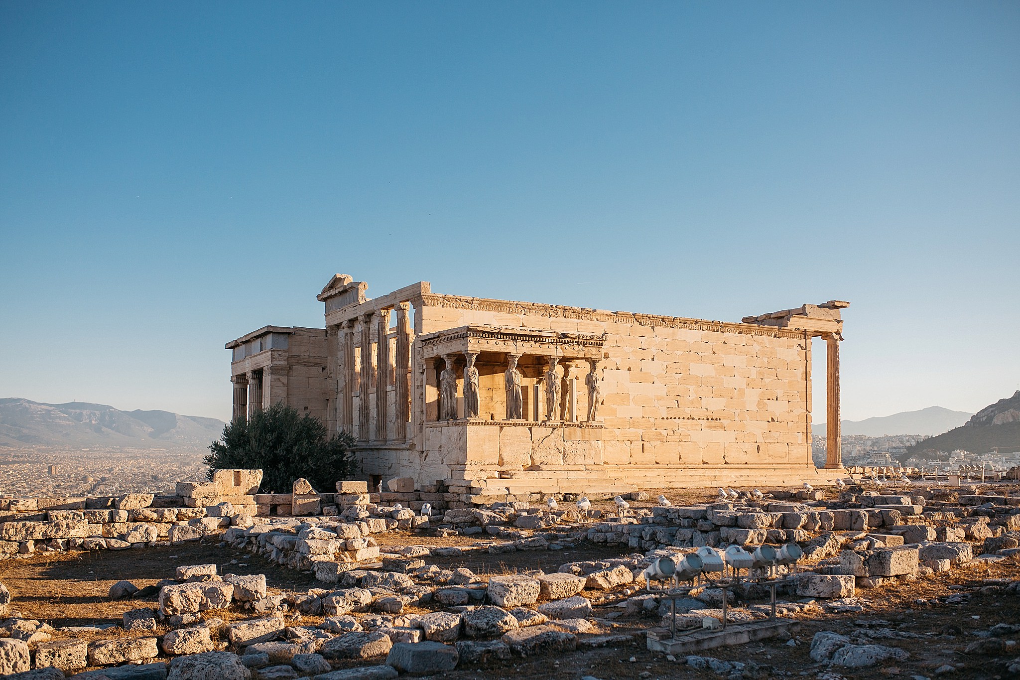    The Erechtheion is an ancient Greek temple on the north side of the Acropolis of Athens in Greece which was dedicated to both Athena and Poseidon.   