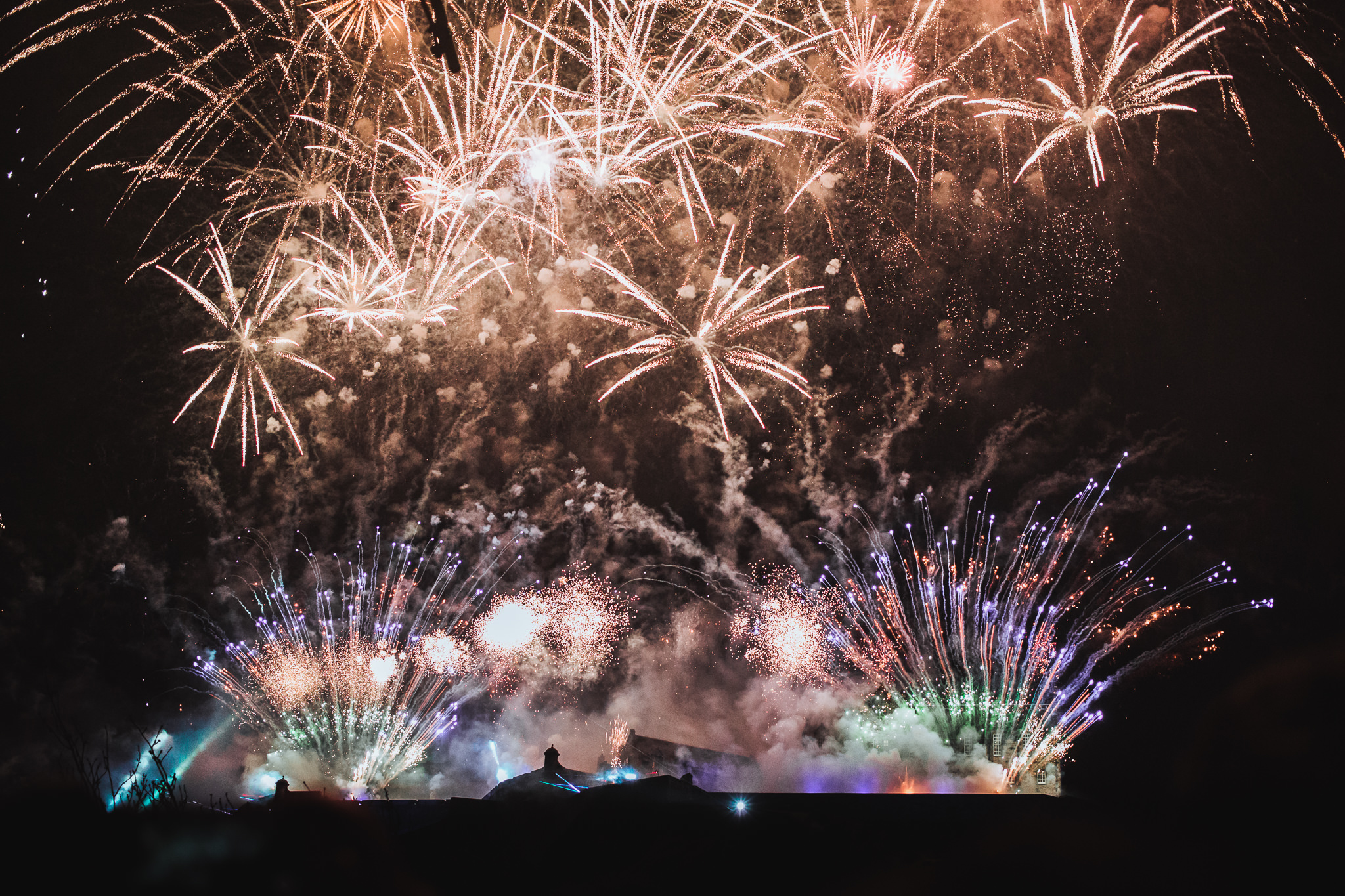 fireworks over castle in scotland