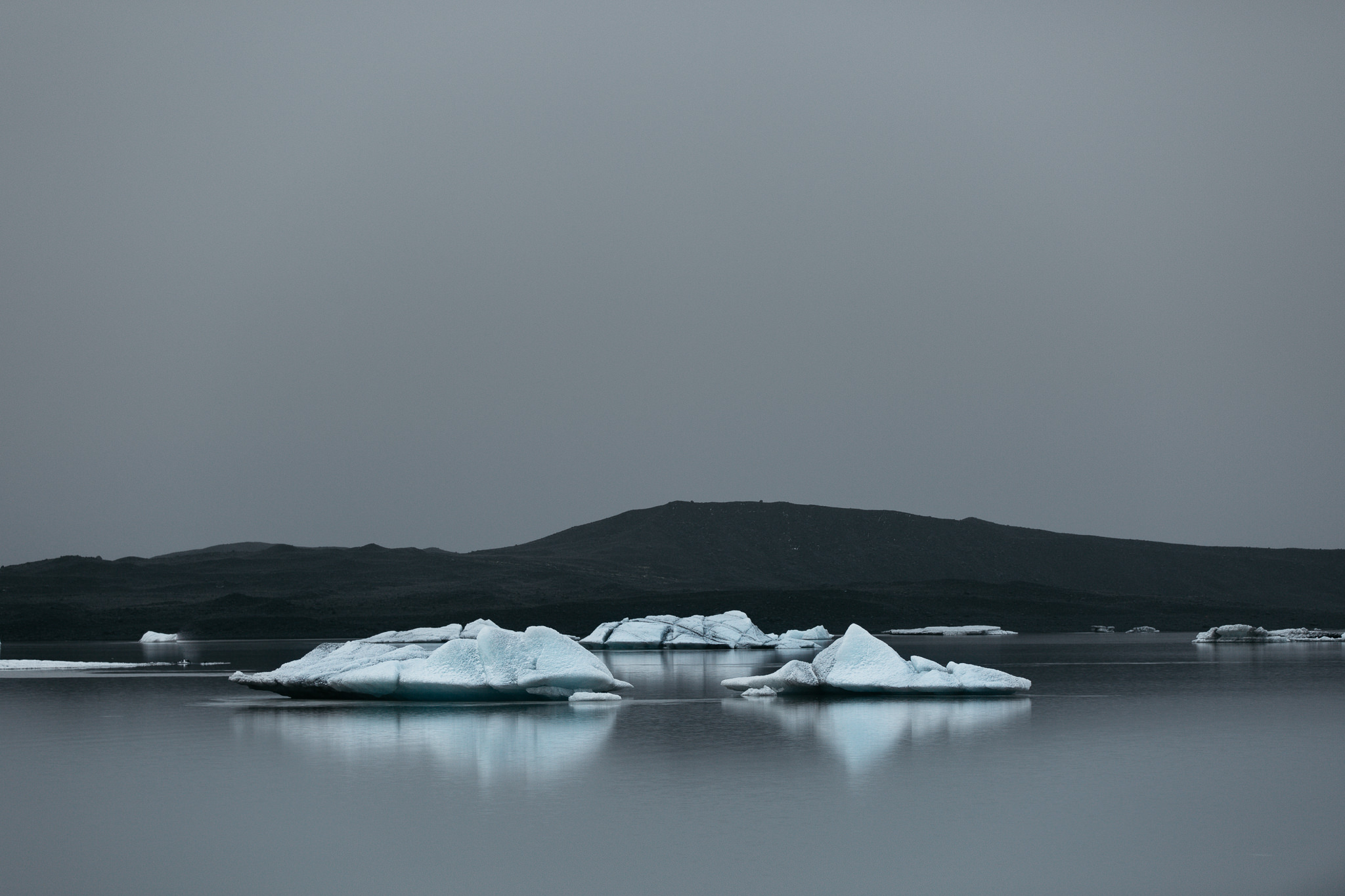 ice bergs floating in lake