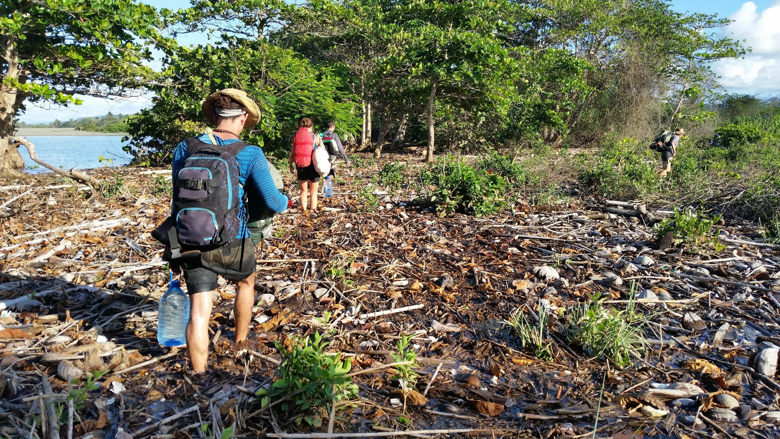 Hiking through thousands of coconut shells and a flooded coast to our next site