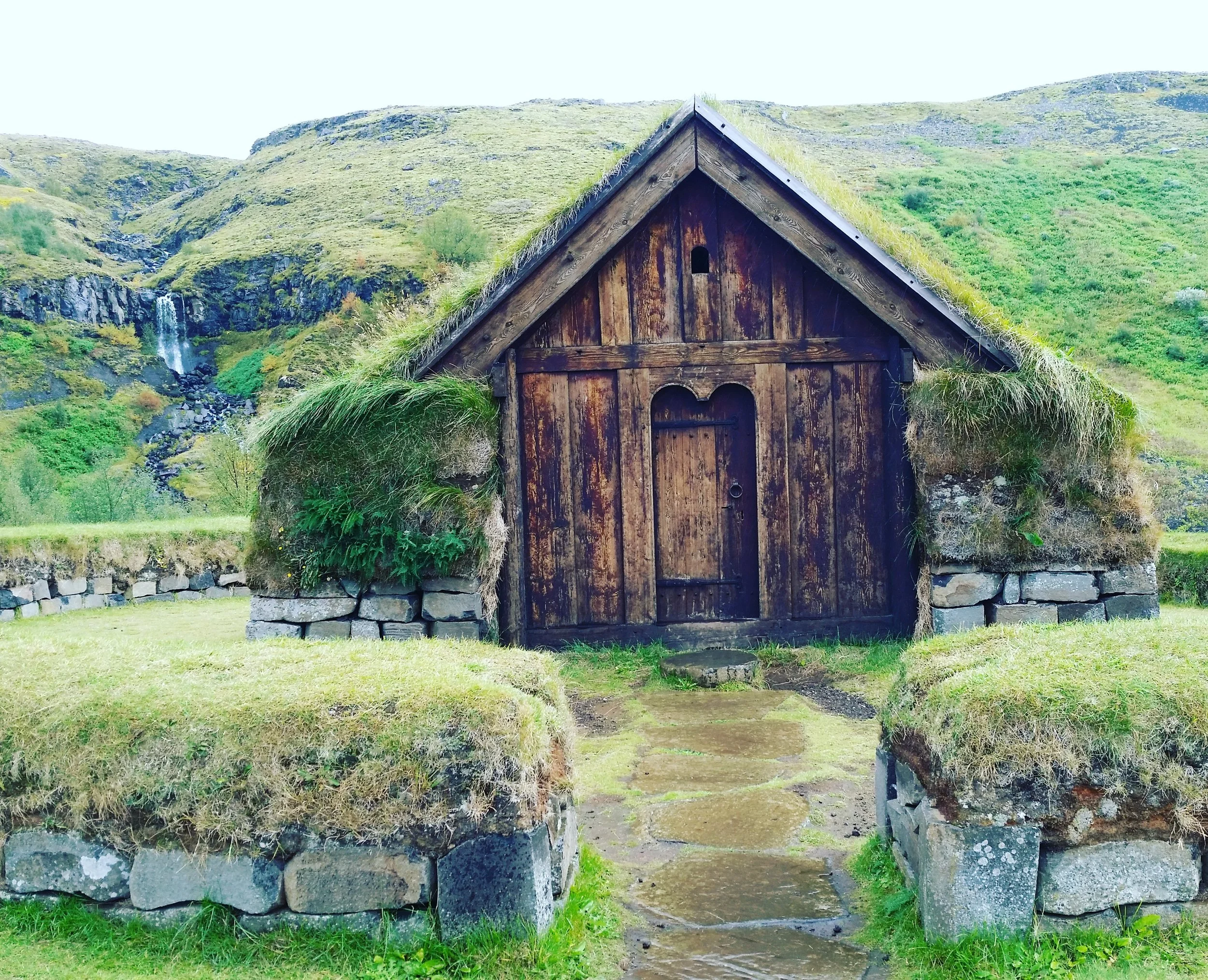 Traditional mossy roofs at Pjodveldisbaer
