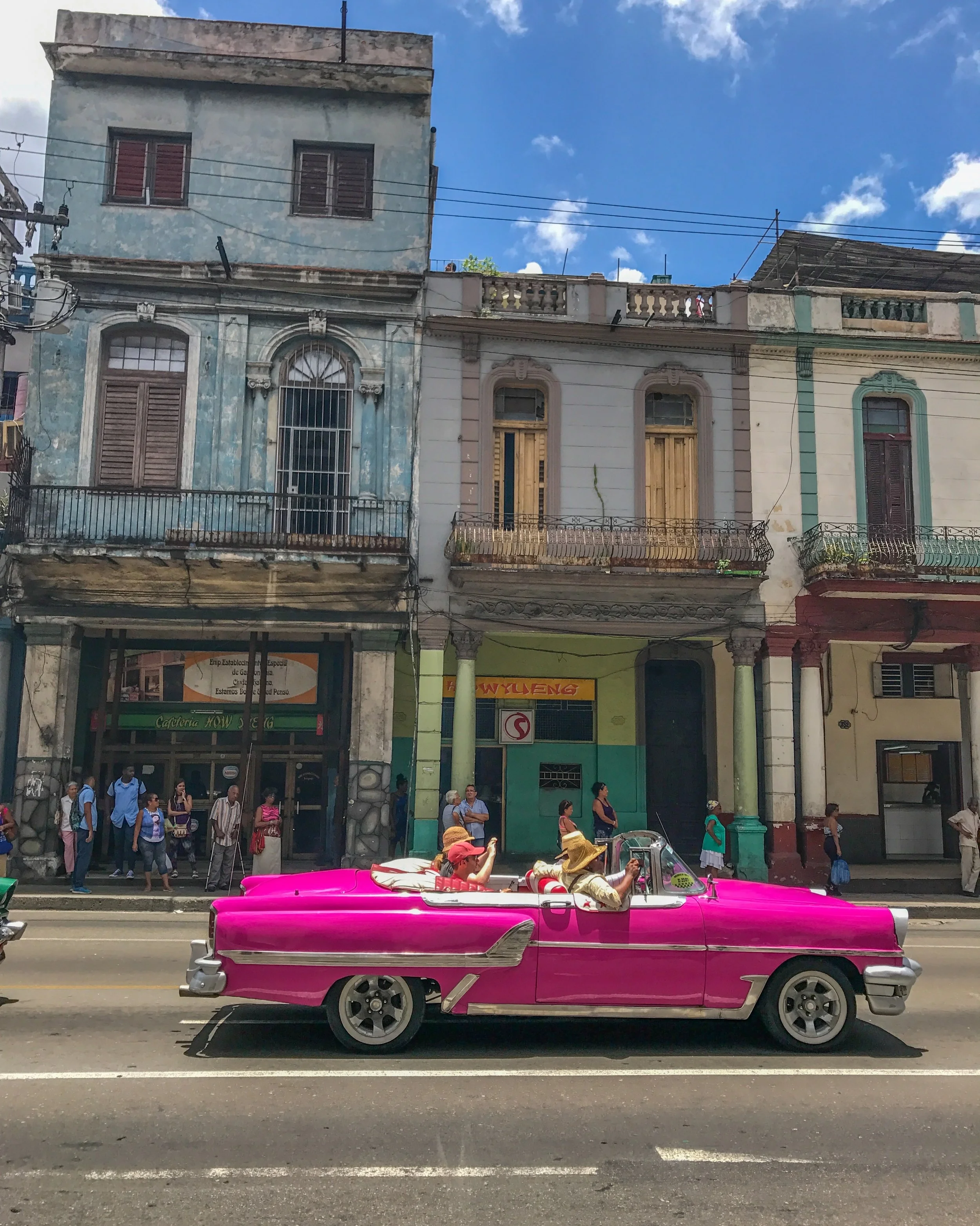 Classic car tour through Central Havana