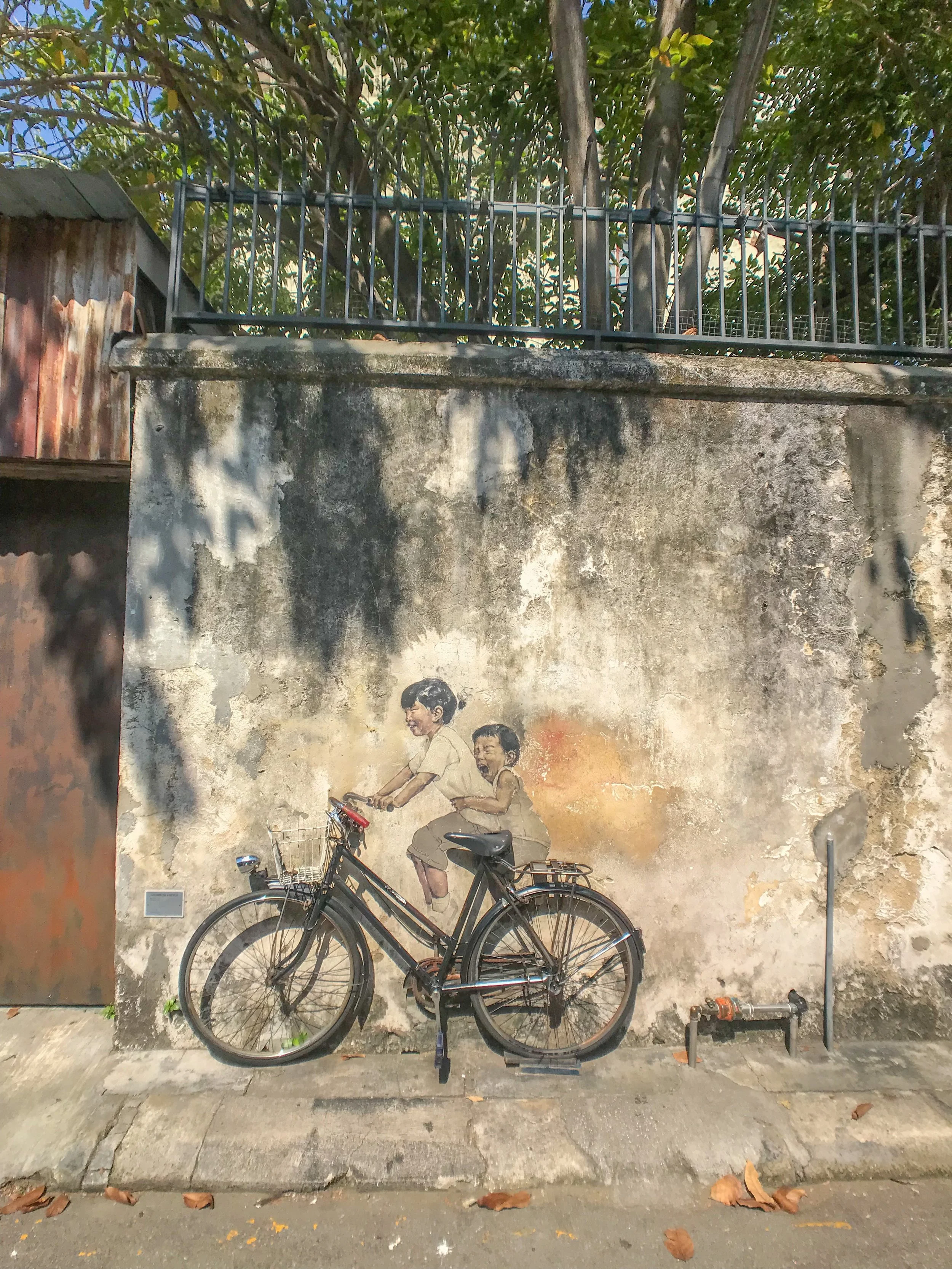 Penang's famous "kids on a bicycle" street art