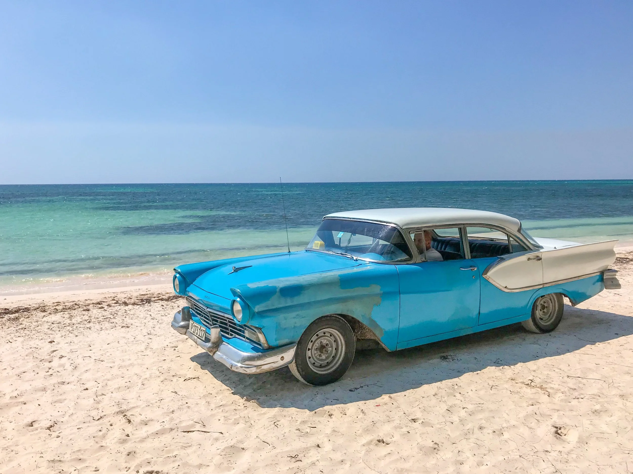 Classic cars on the beach in Vinales