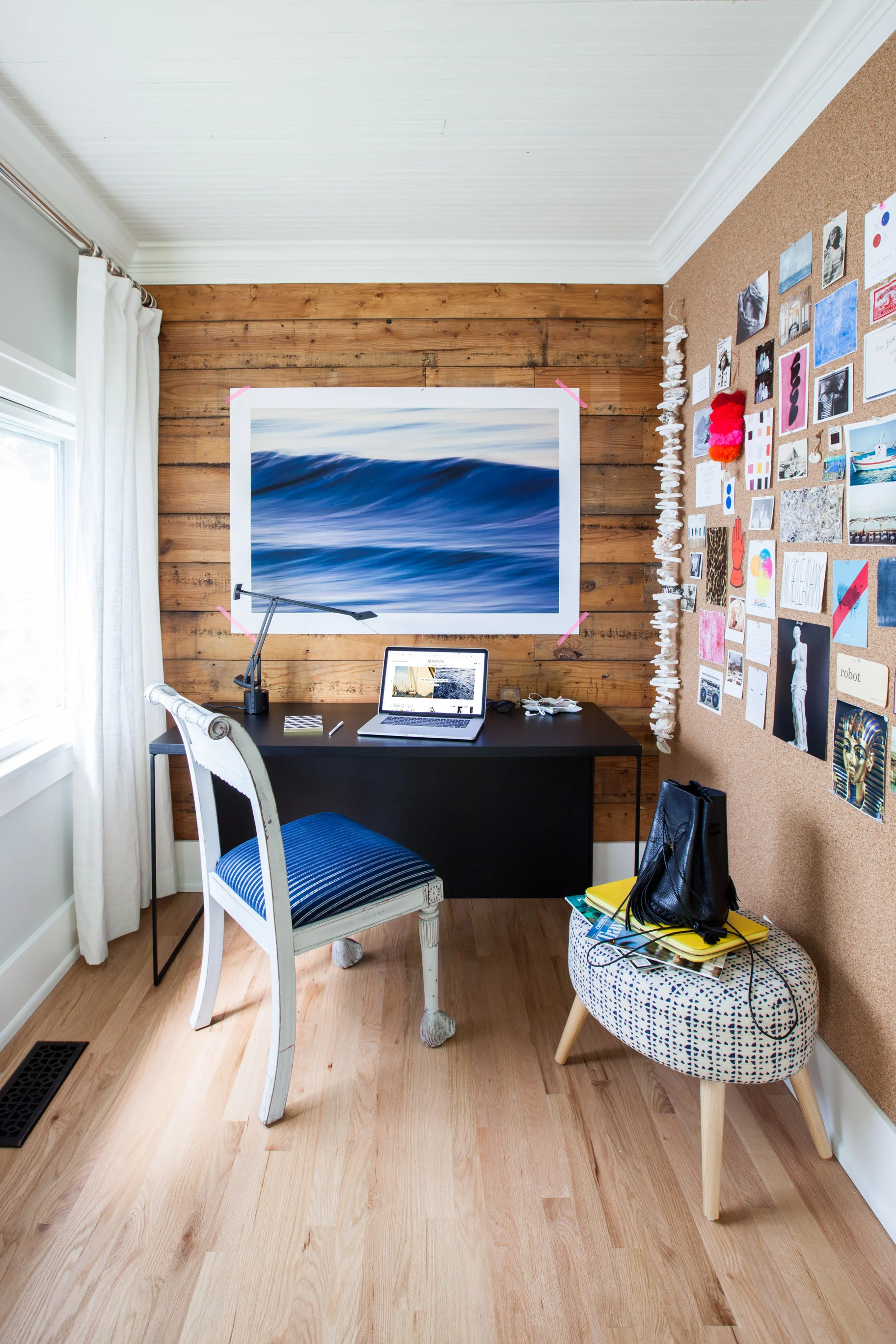 Michelle's home office, featuring Waves II by Greg Anthon . Photo by Marta Xochilt Perez .