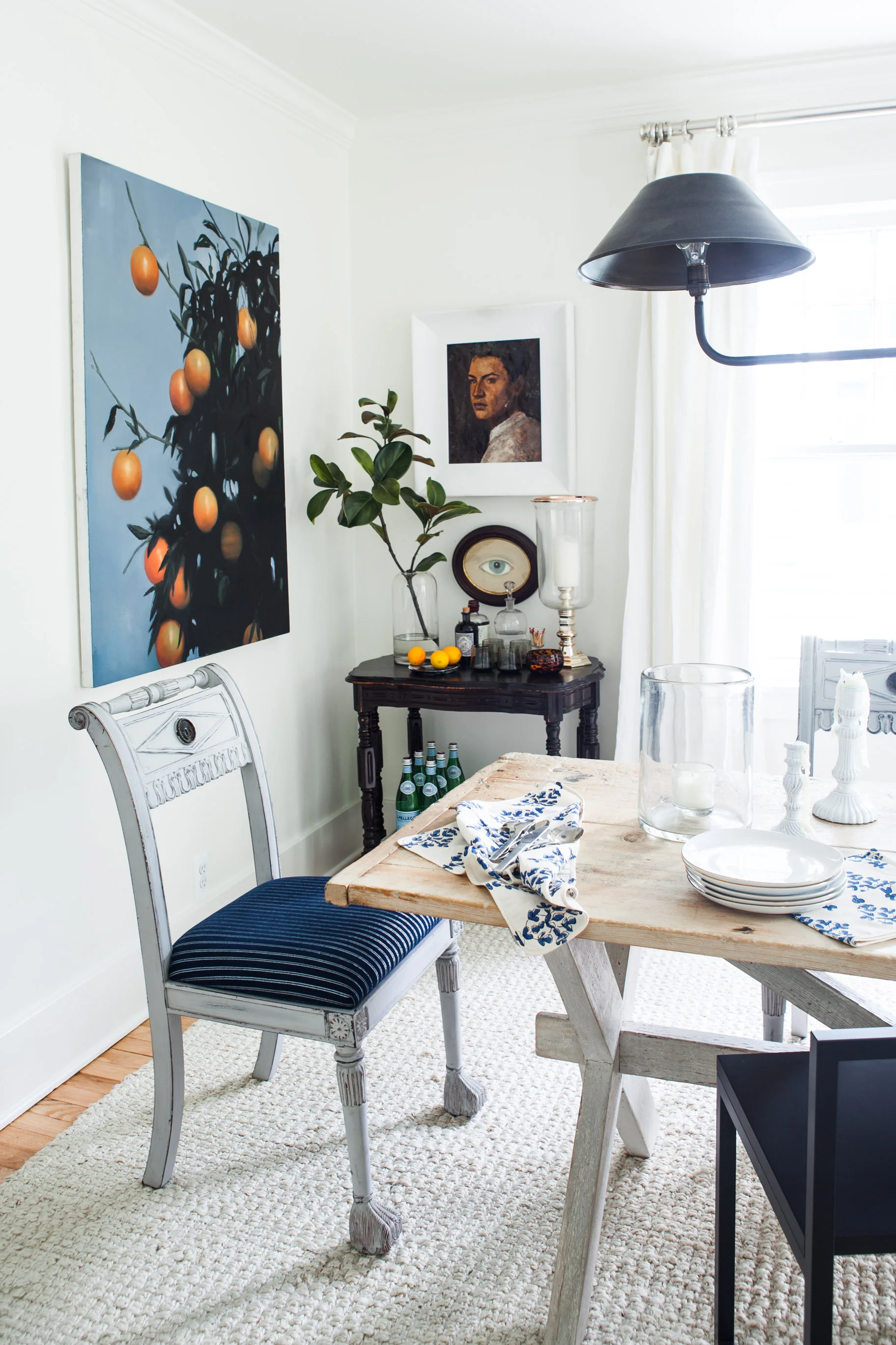 A few of Michelle's all-time favorite pieces hang in her dining room. Photo by Marta Xochilt Perez