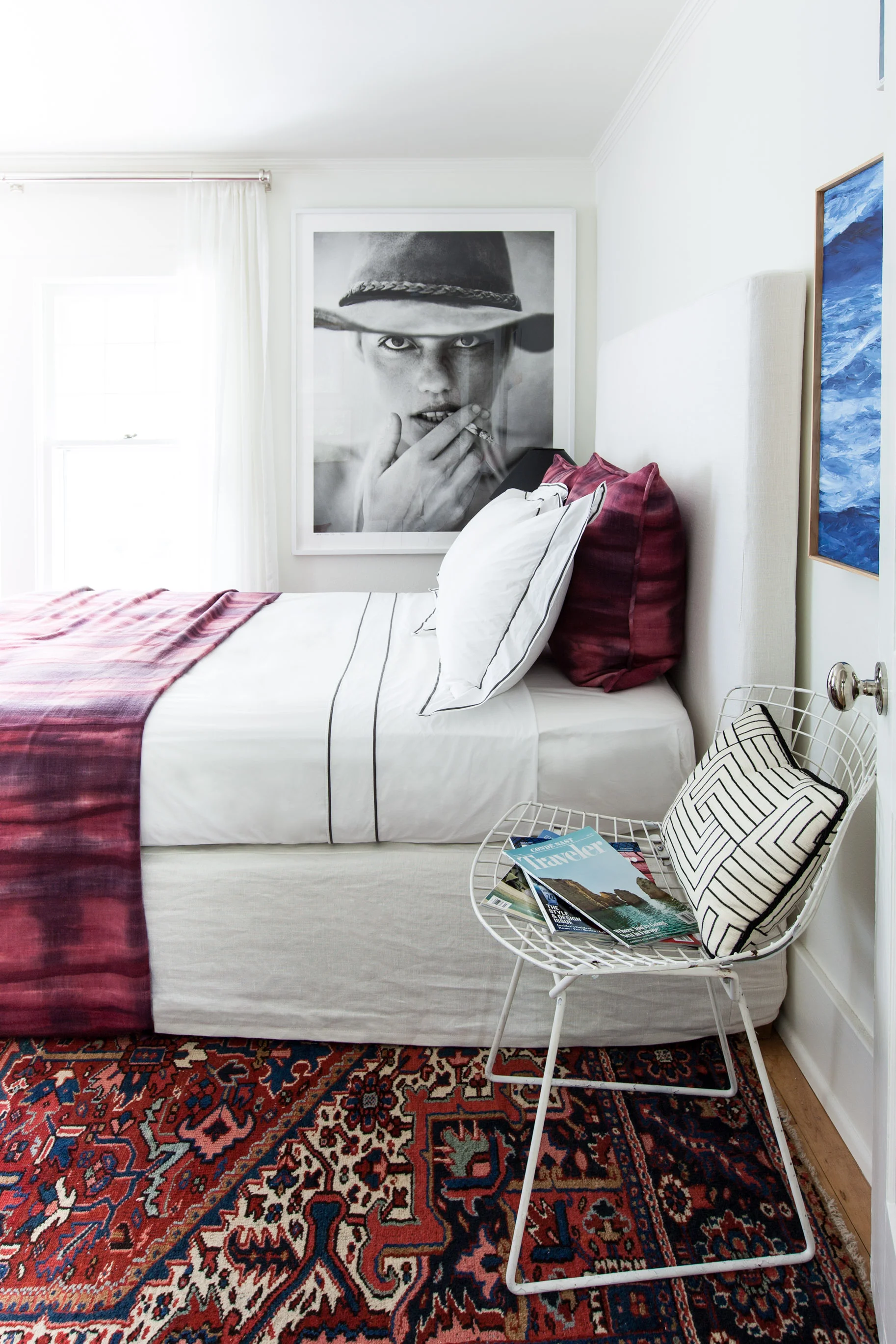 In her guest room, Michelle uses an oversize photograph to create an immediate focal point. Photo by Marta Xochilt Perez . 