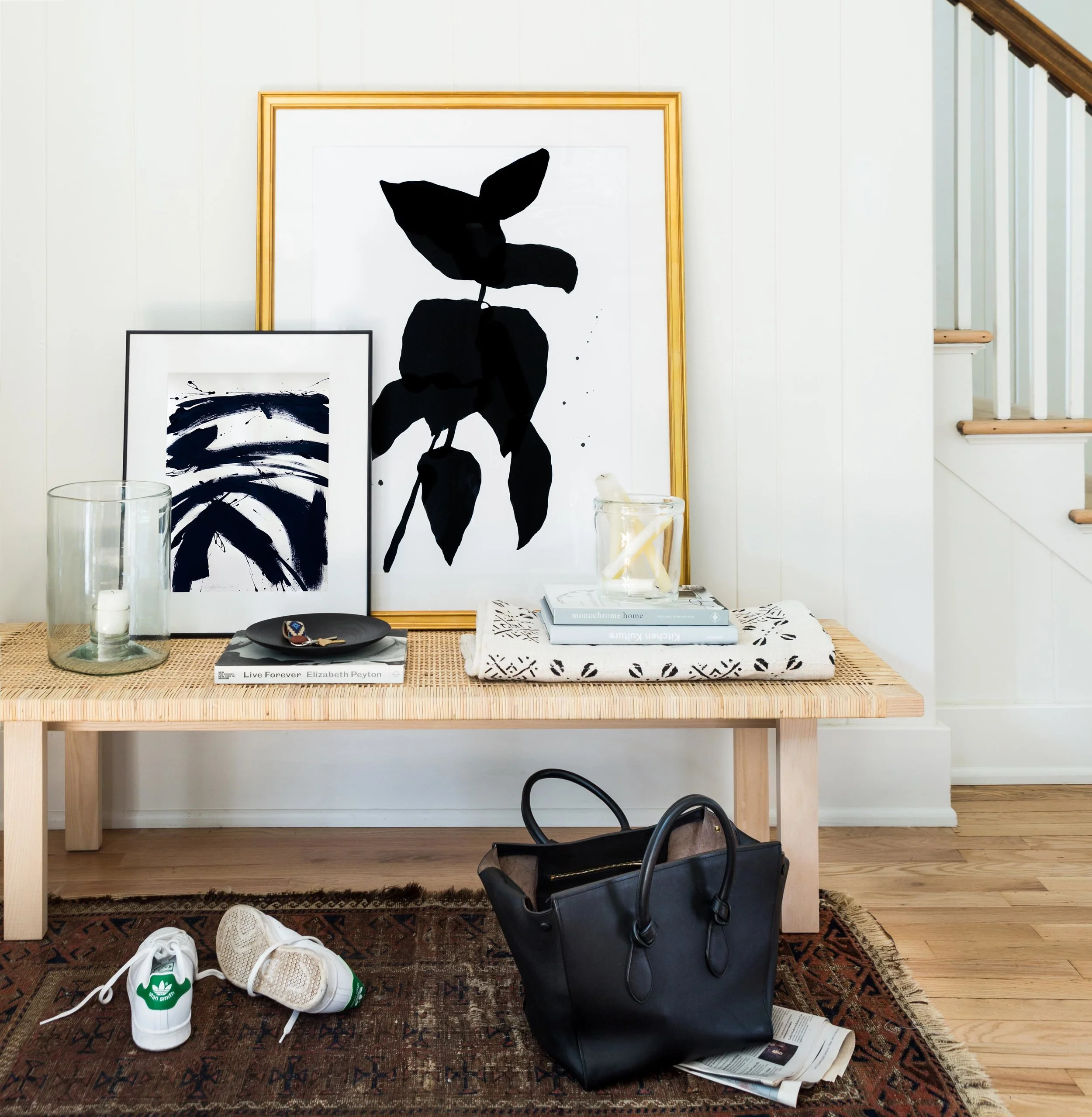 B + W #3 by Jill Sykes (left) and Long Branch One by Kate Roebuck (right). Photo by Marta X. Perez for Artfully Walls.