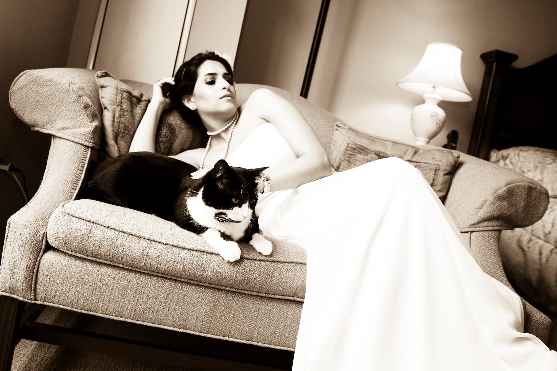 Bride and her kitty cat on couch