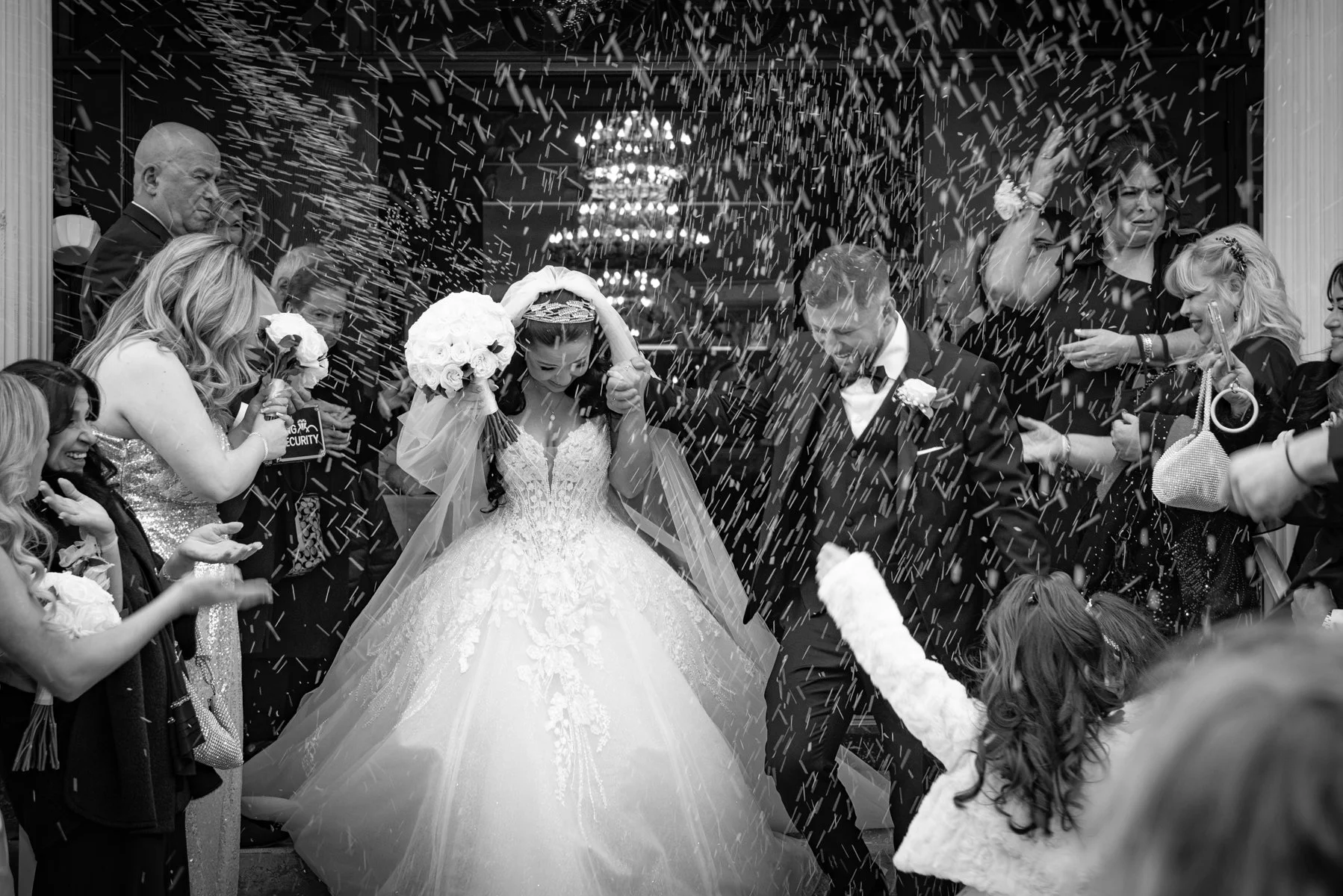 Juliet + Kosta &mdash; your sneak peek from Parkview Manor.
Kosta in the line with the traditional dancers on a monogrammed floor &mdash; not watching, performing. Indoor fireworks for the first dance. And then the church doors opened and the rice ca