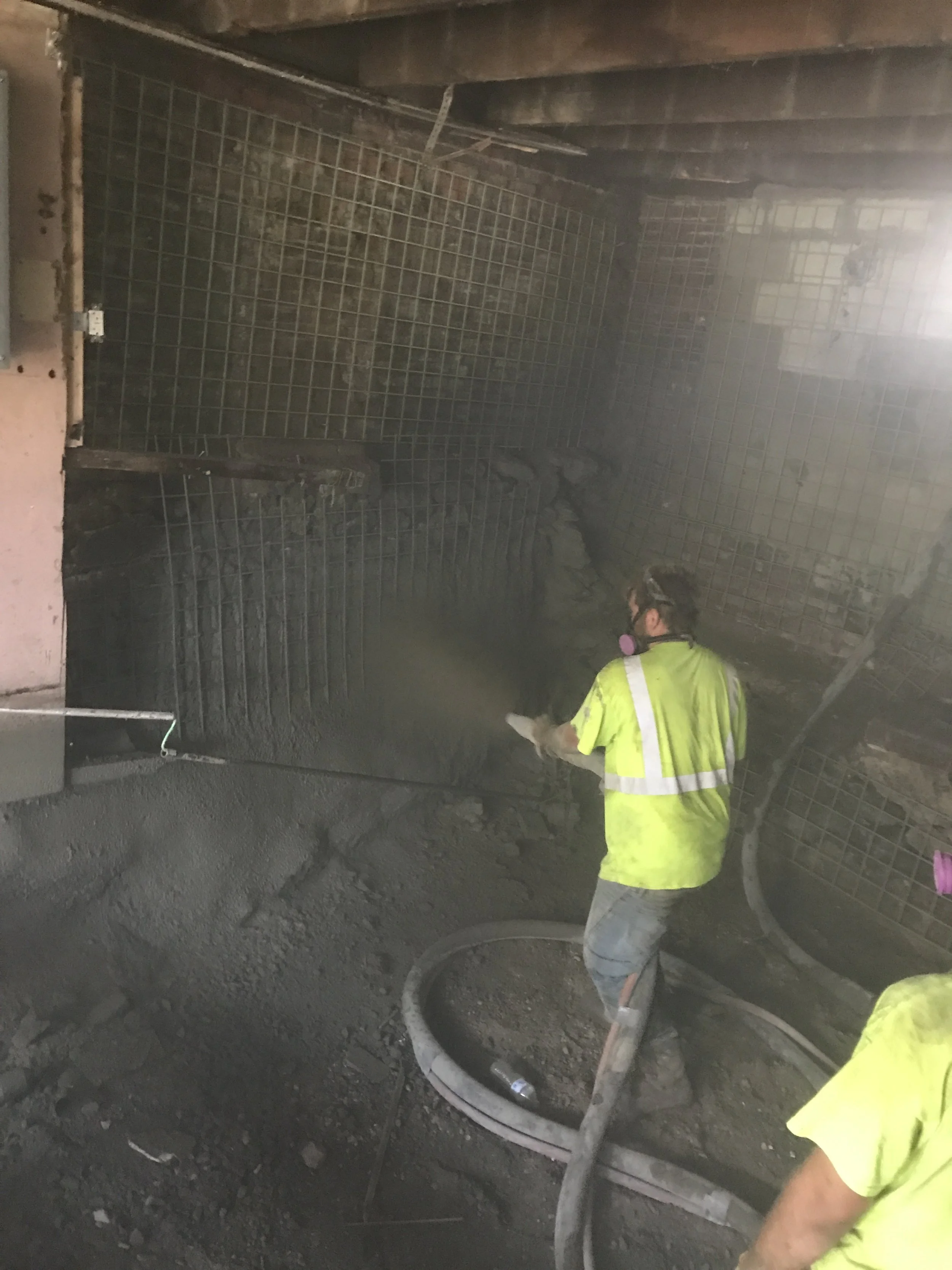 Our expert team in action spraying the shotcrete. Shotcrete is typically used in commercial applications such as Sea Walls and Subway stations due to its strength and longevity. 